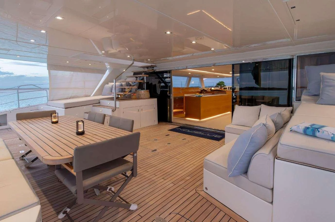 a room with a table and couches aboard DIANA Yacht for Charter