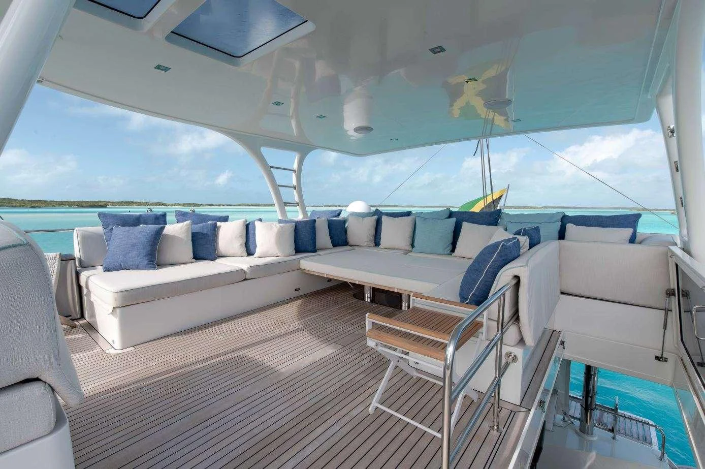 a large living room with a large window aboard DIANA Yacht for Charter