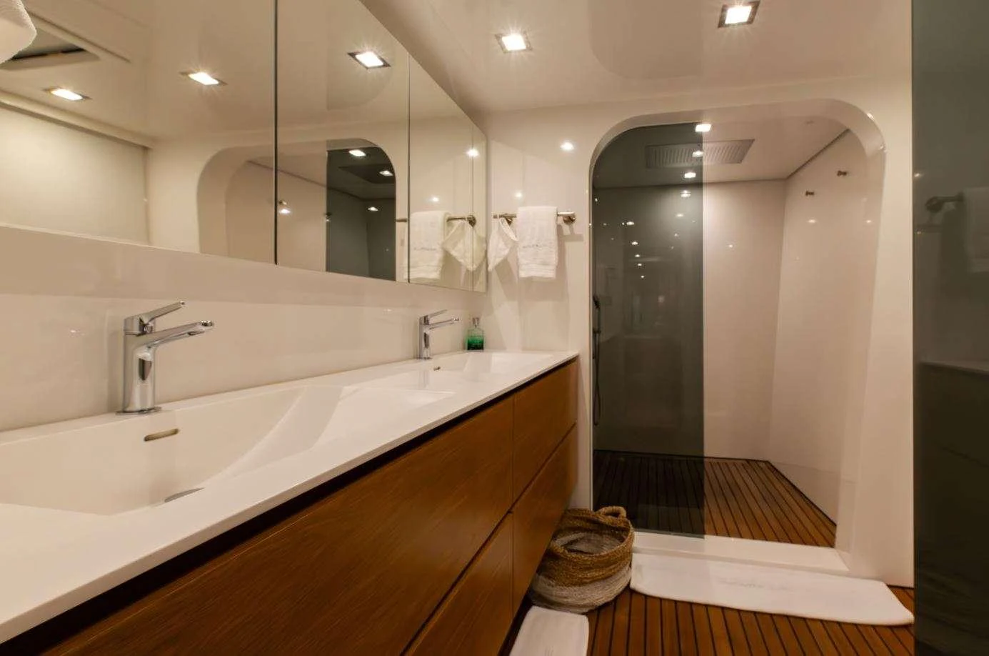 a bathroom with a large mirror aboard DIANA Yacht for Charter