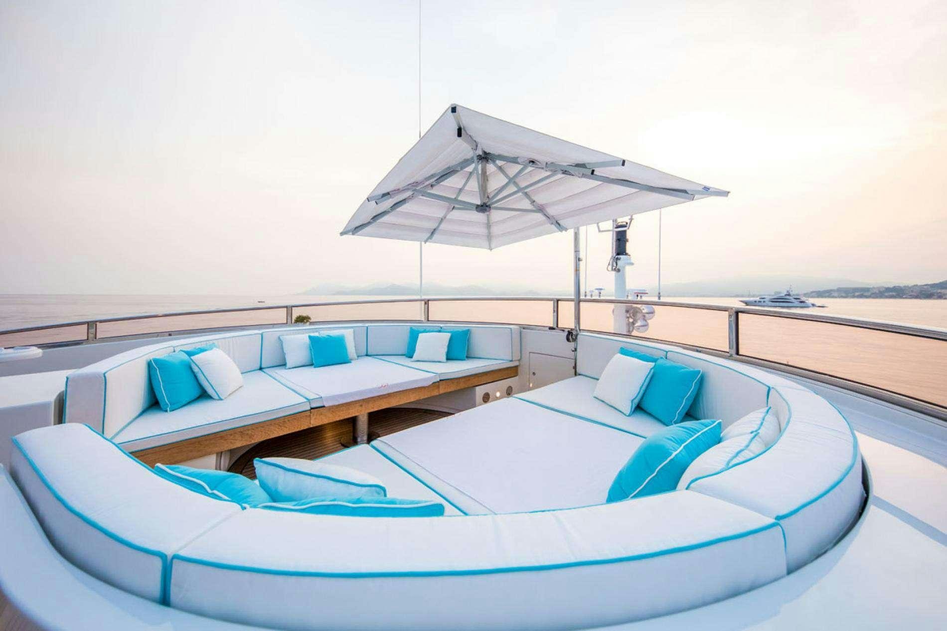 a boat with a white umbrella on it aboard ARTHUR'S WAY Yacht for Charter