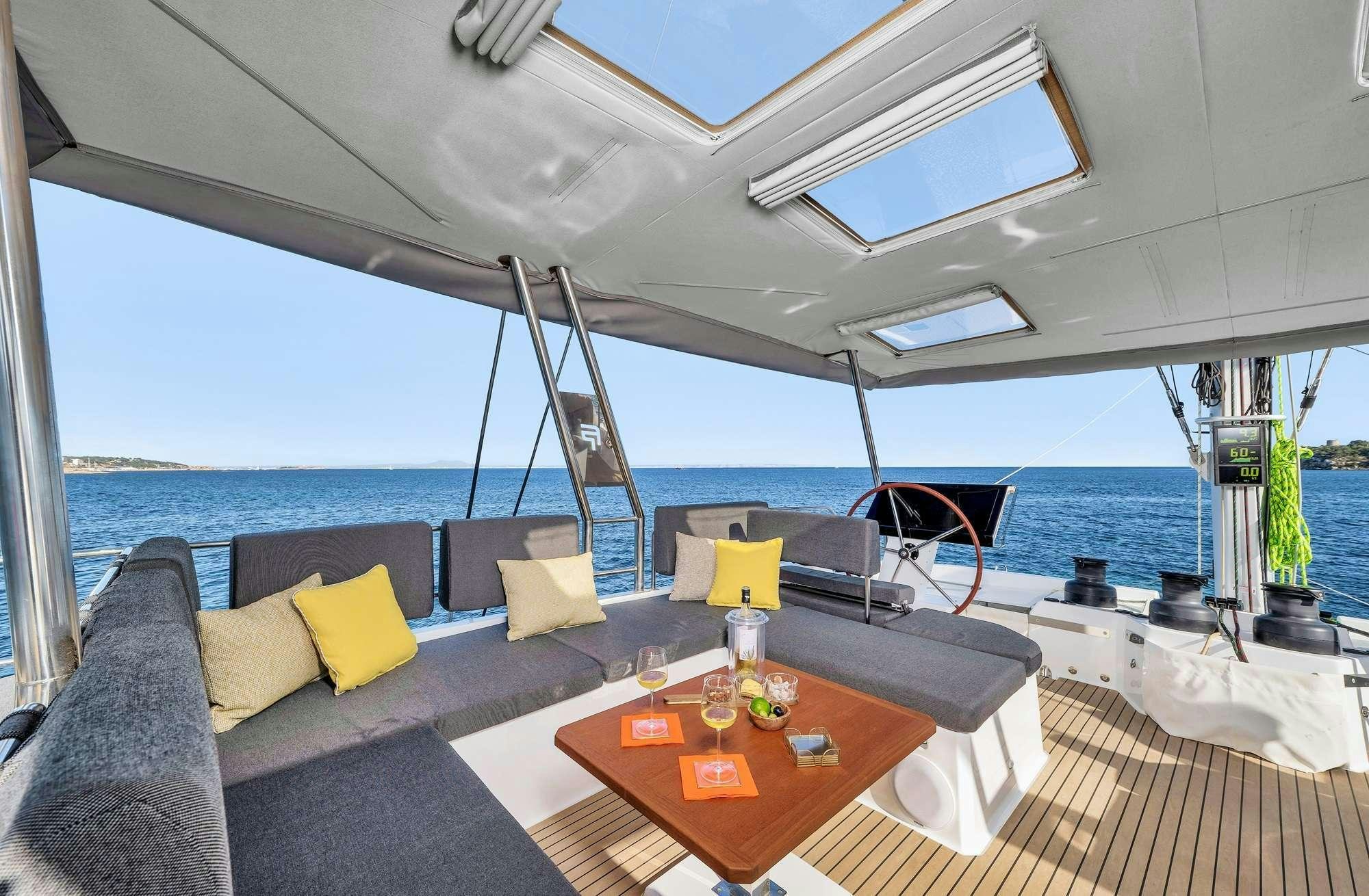 a table on a boat aboard ALEGRIA 67 Yacht for Charter