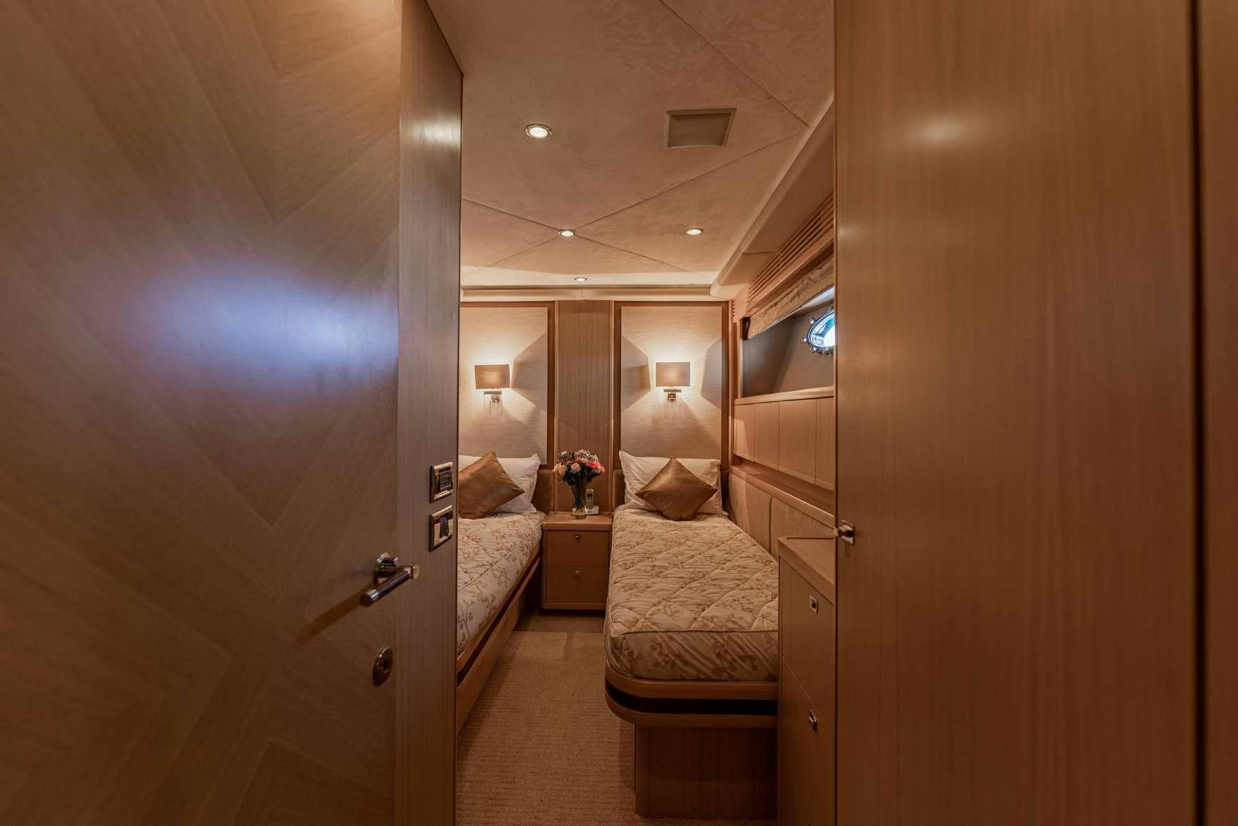a room with two beds aboard BLUE EYES Yacht for Charter