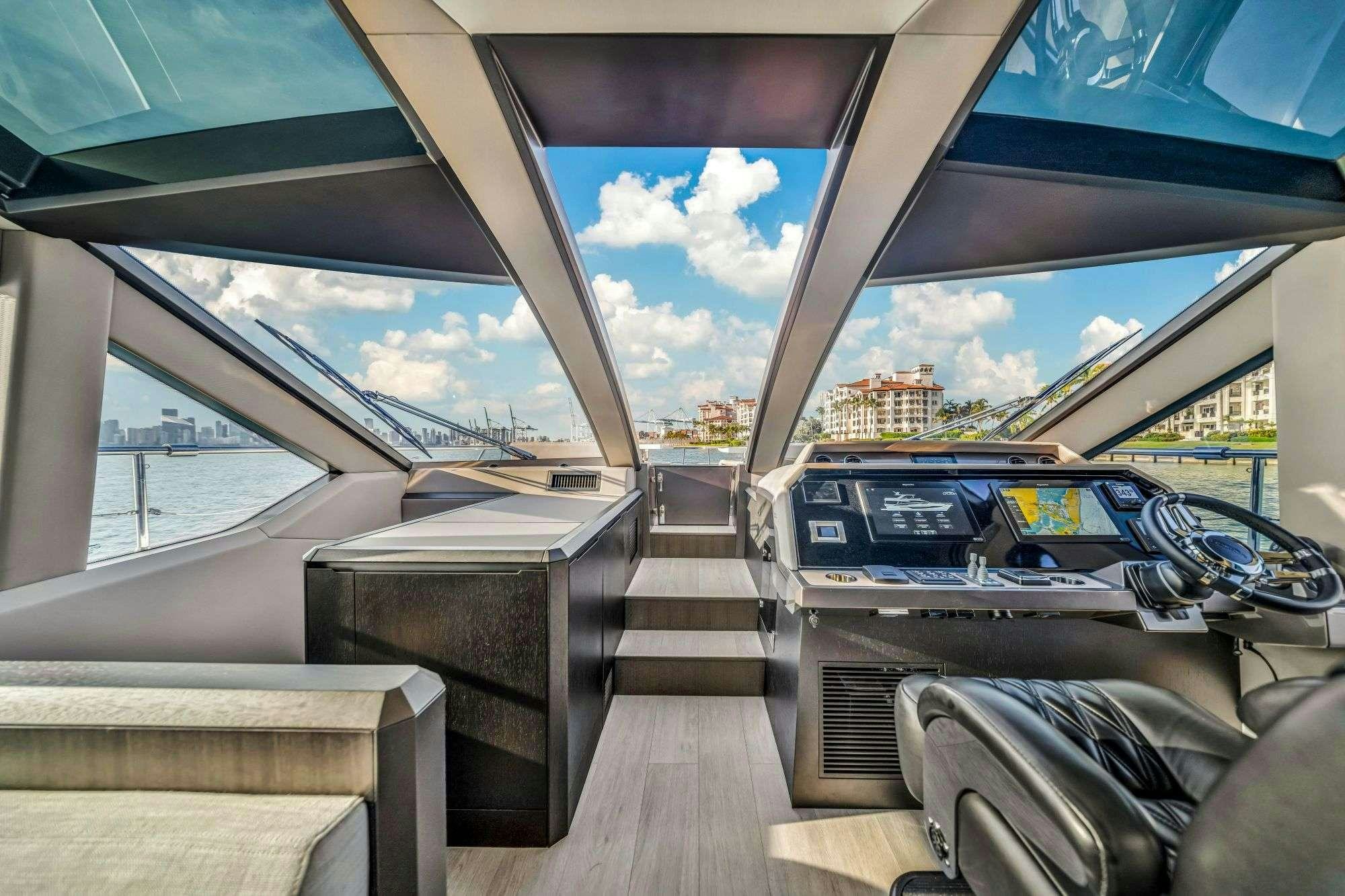 inside of a car aboard OPTIMUS PRIME Yacht for Charter