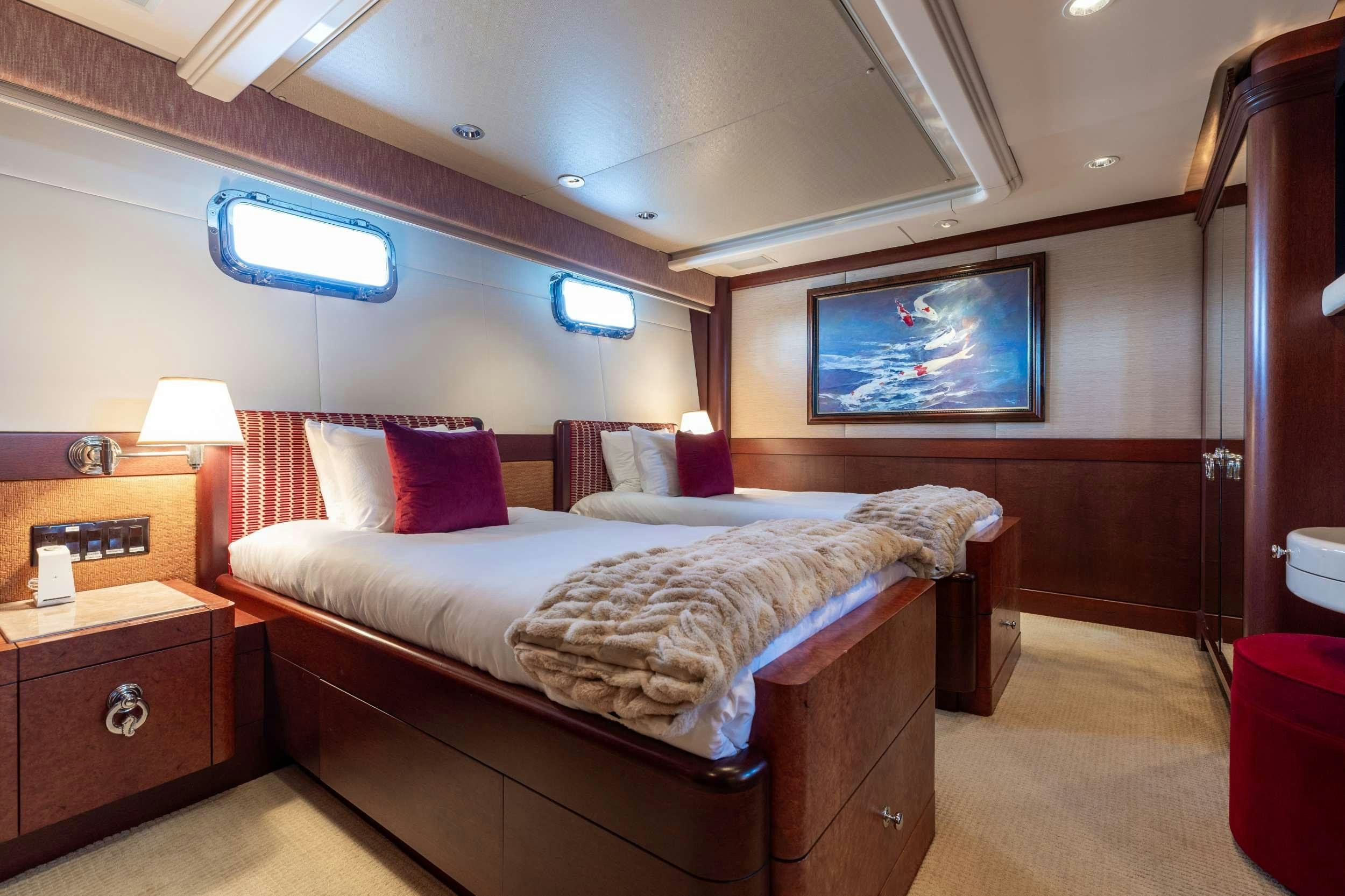a bed in a room aboard LANIDA Yacht for Charter
