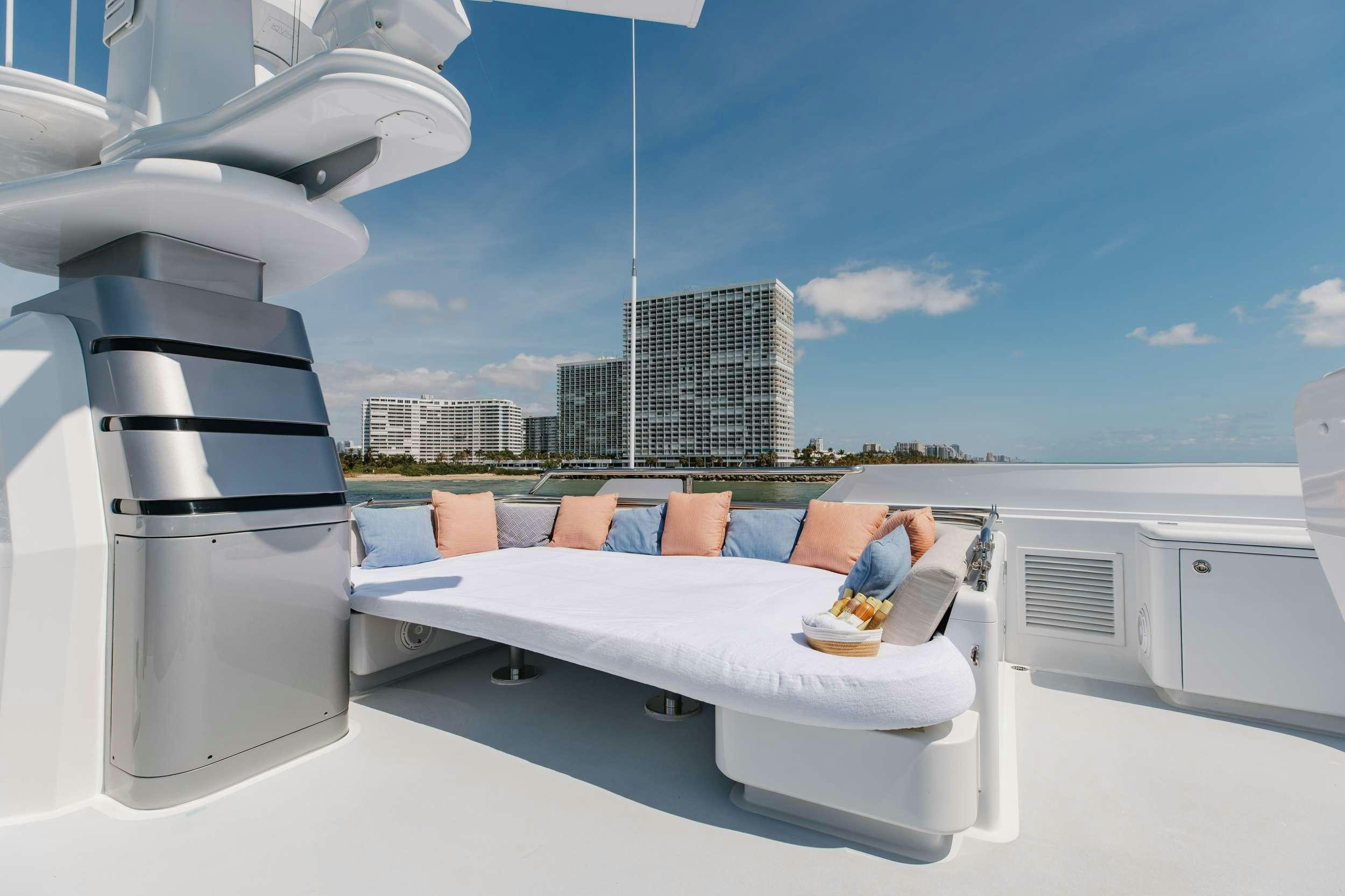 a white bed on a boat aboard LANIDA Yacht for Charter