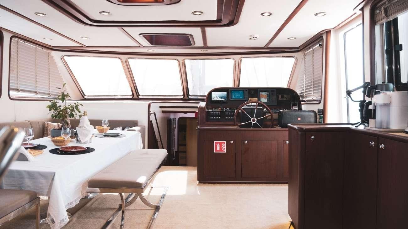 a car in a room aboard LUJA Yacht for Charter