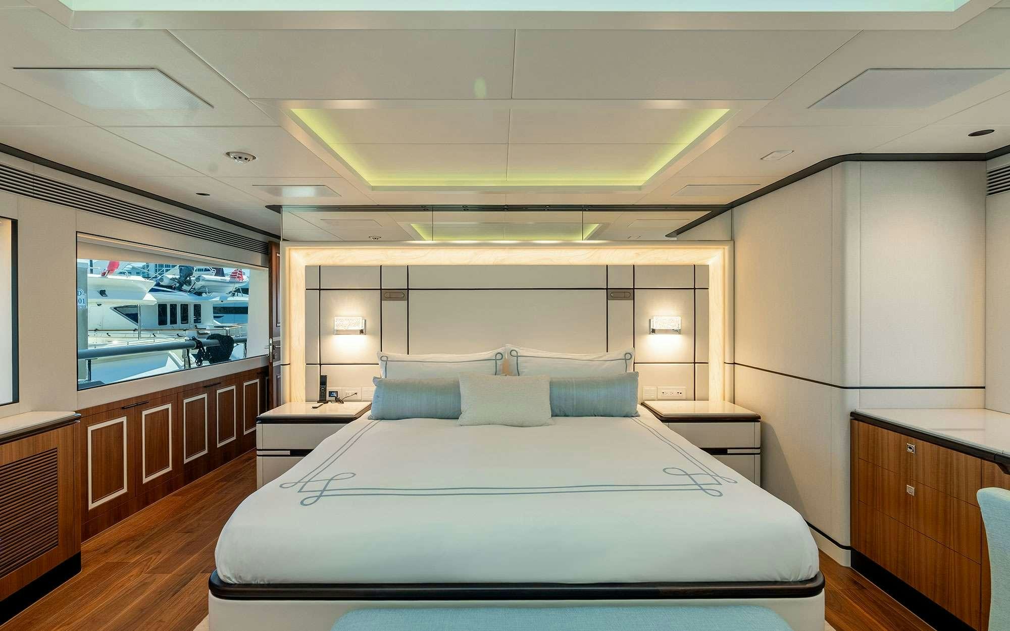 a large bed in a room aboard MISS MICHELLE Yacht for Charter