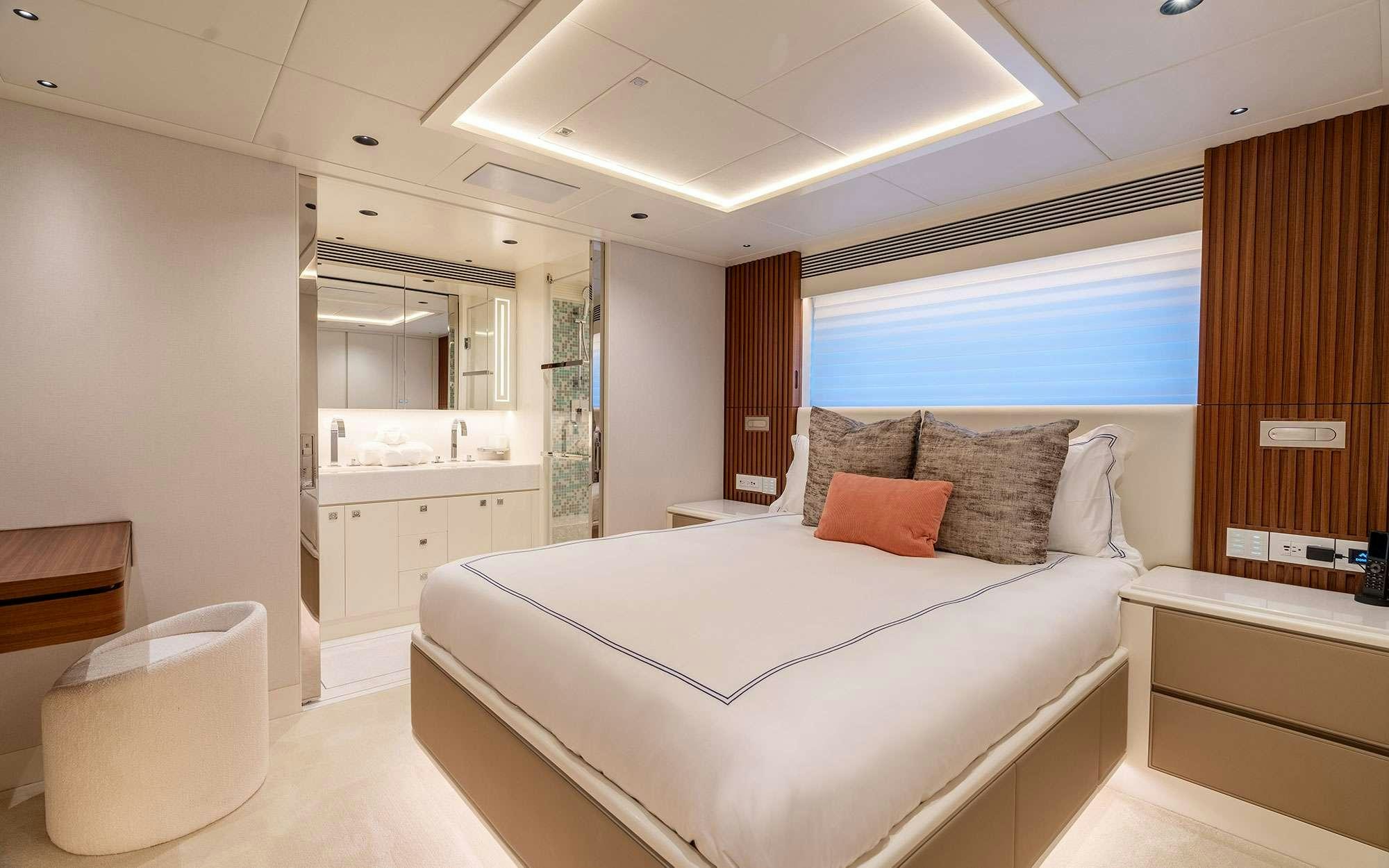 a large bedroom with a large bed aboard MISS MICHELLE Yacht for Charter
