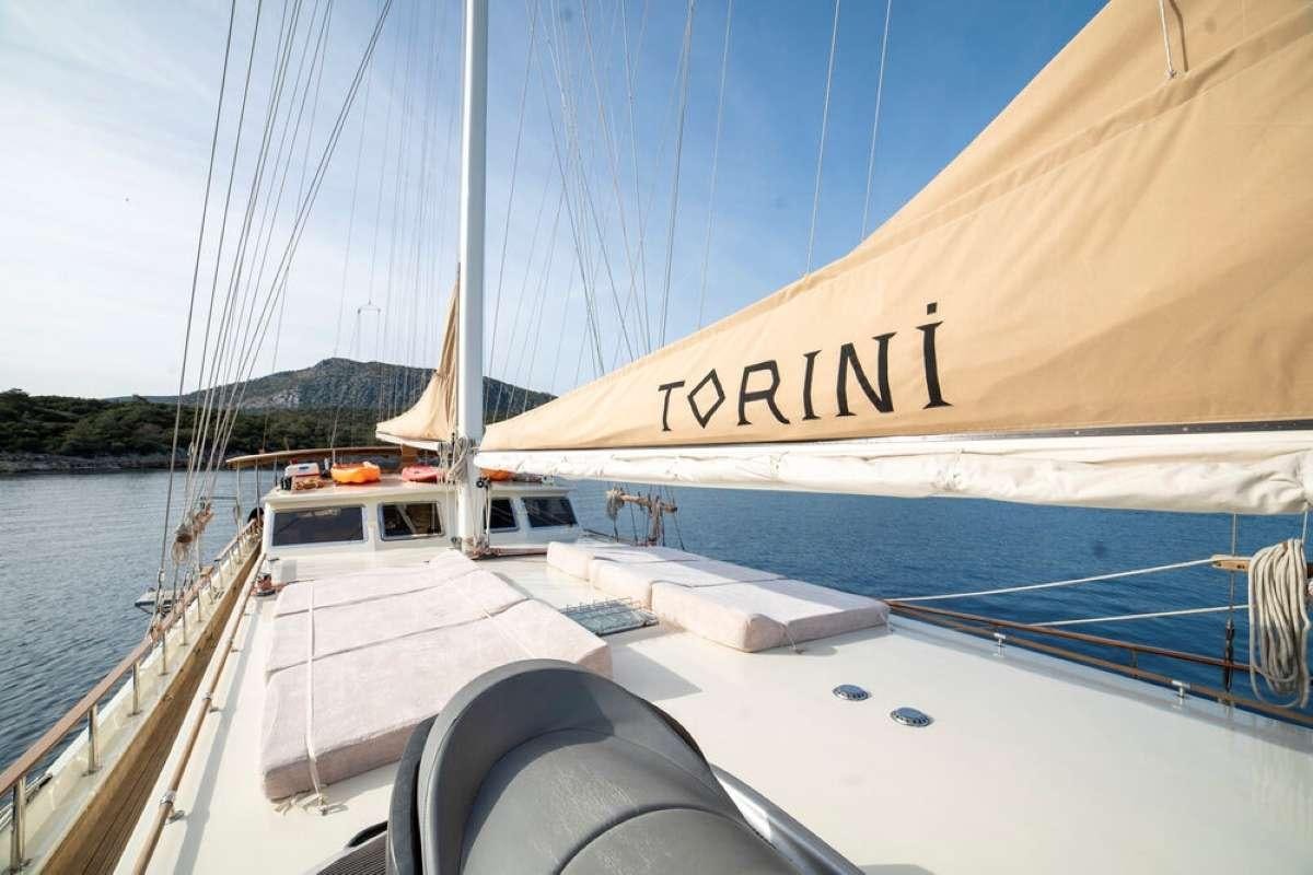 a boat on the water aboard TORINI Yacht for Charter