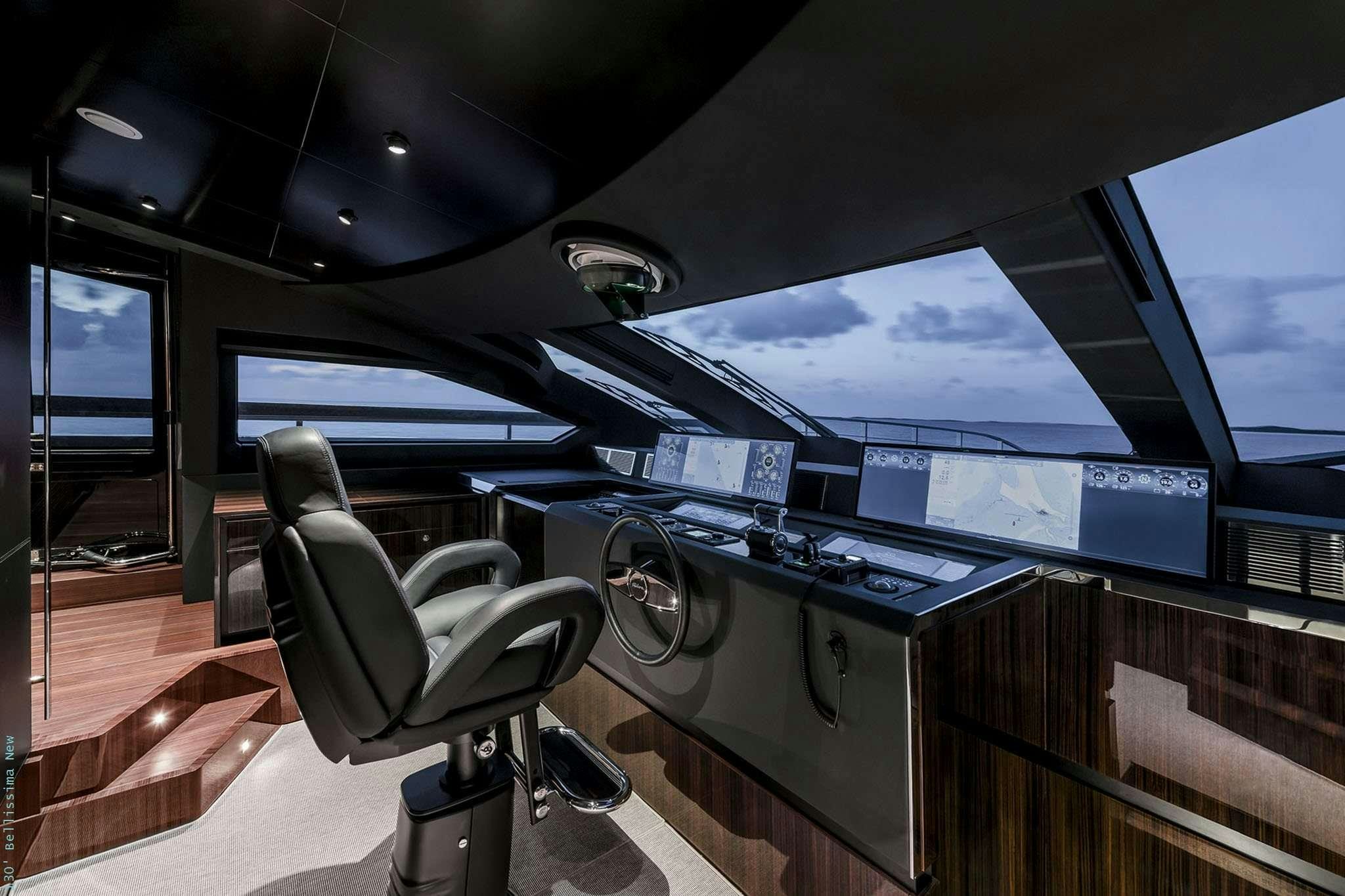 a room with a large computer screen aboard TASTY WAVES Yacht for Charter