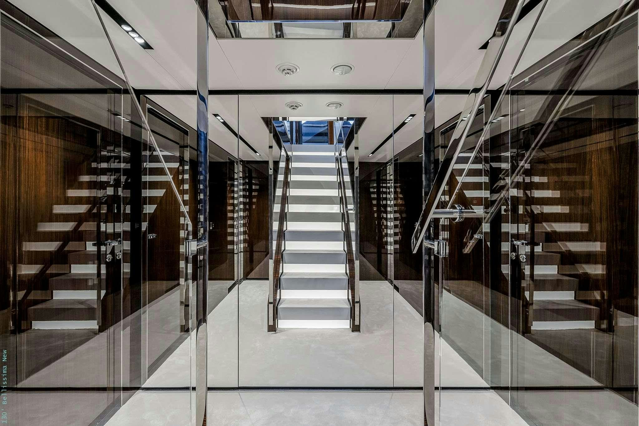 a large room with several escalators aboard TASTY WAVES Yacht for Charter