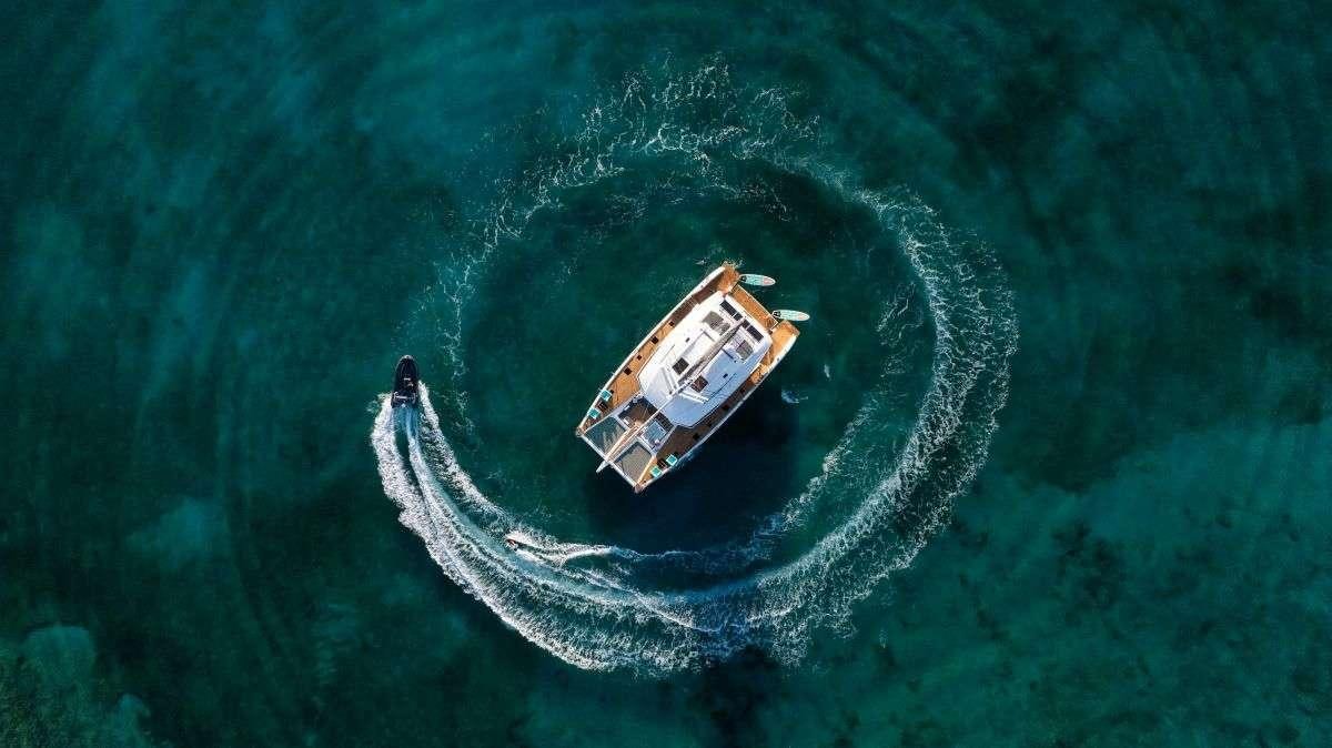 a boat in the water aboard LYRA Yacht for Charter