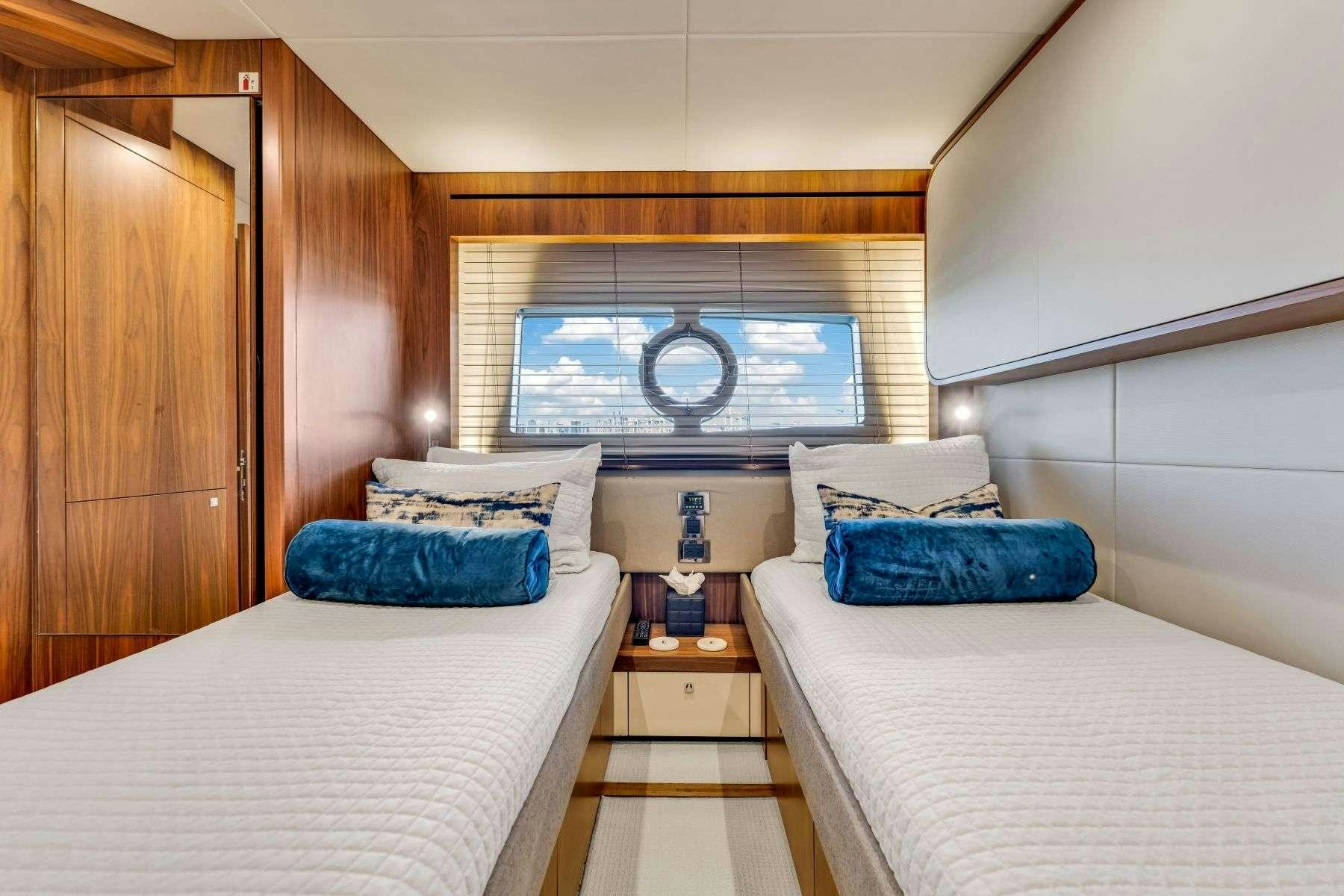 a room with two beds aboard RMM JOB Yacht for Charter
