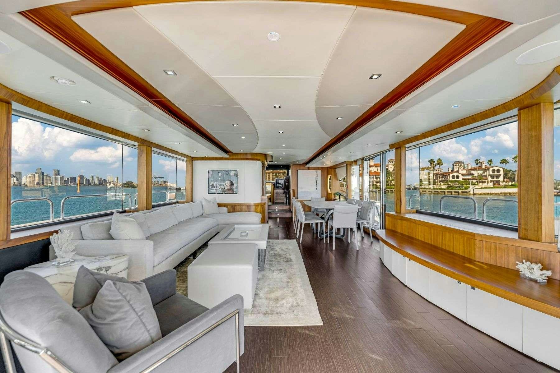 inside of a building with a large window and a large open window aboard RMM JOB Yacht for Charter