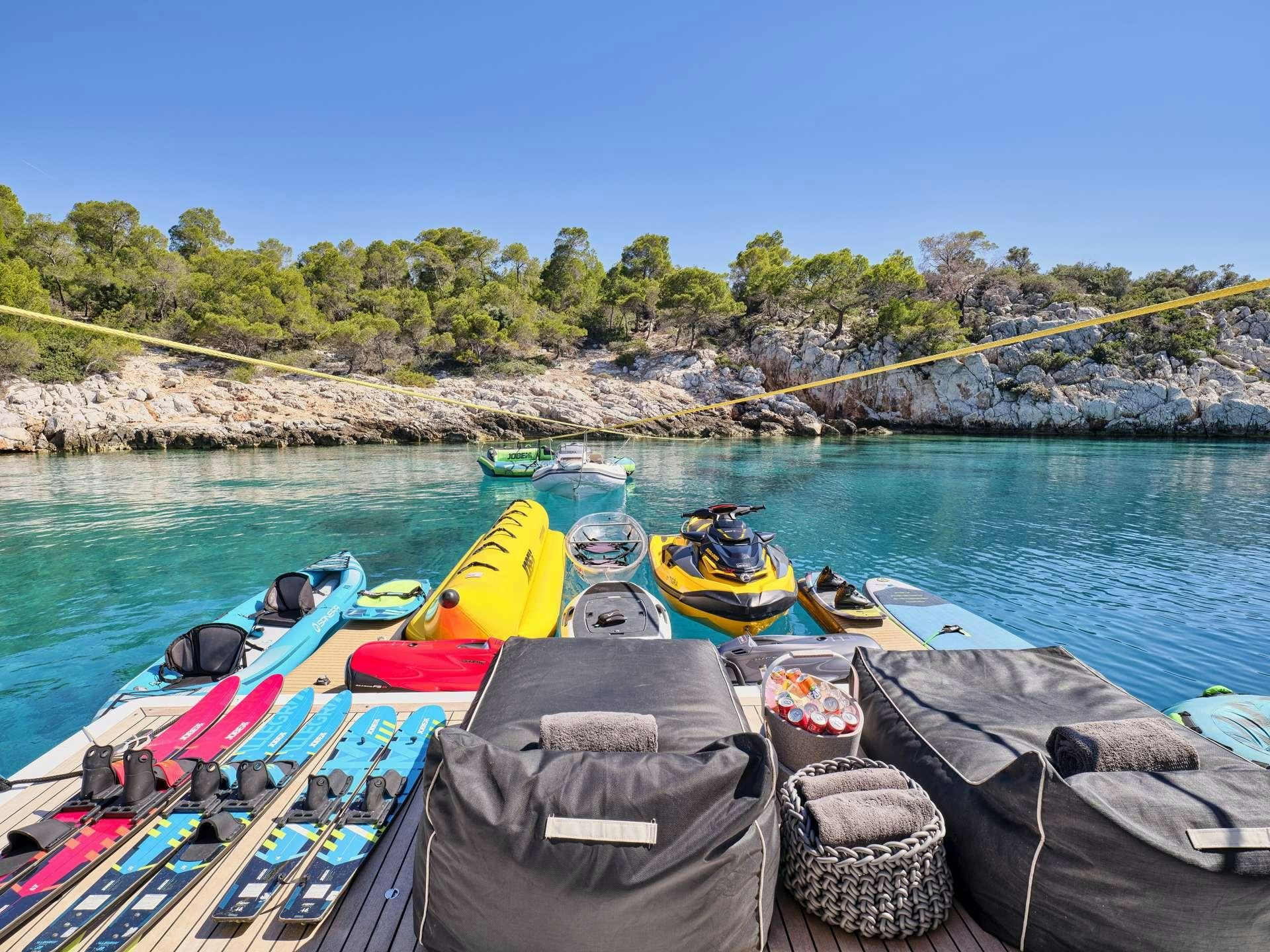 a group of boats on a lake aboard TIGRA Yacht for Charter
