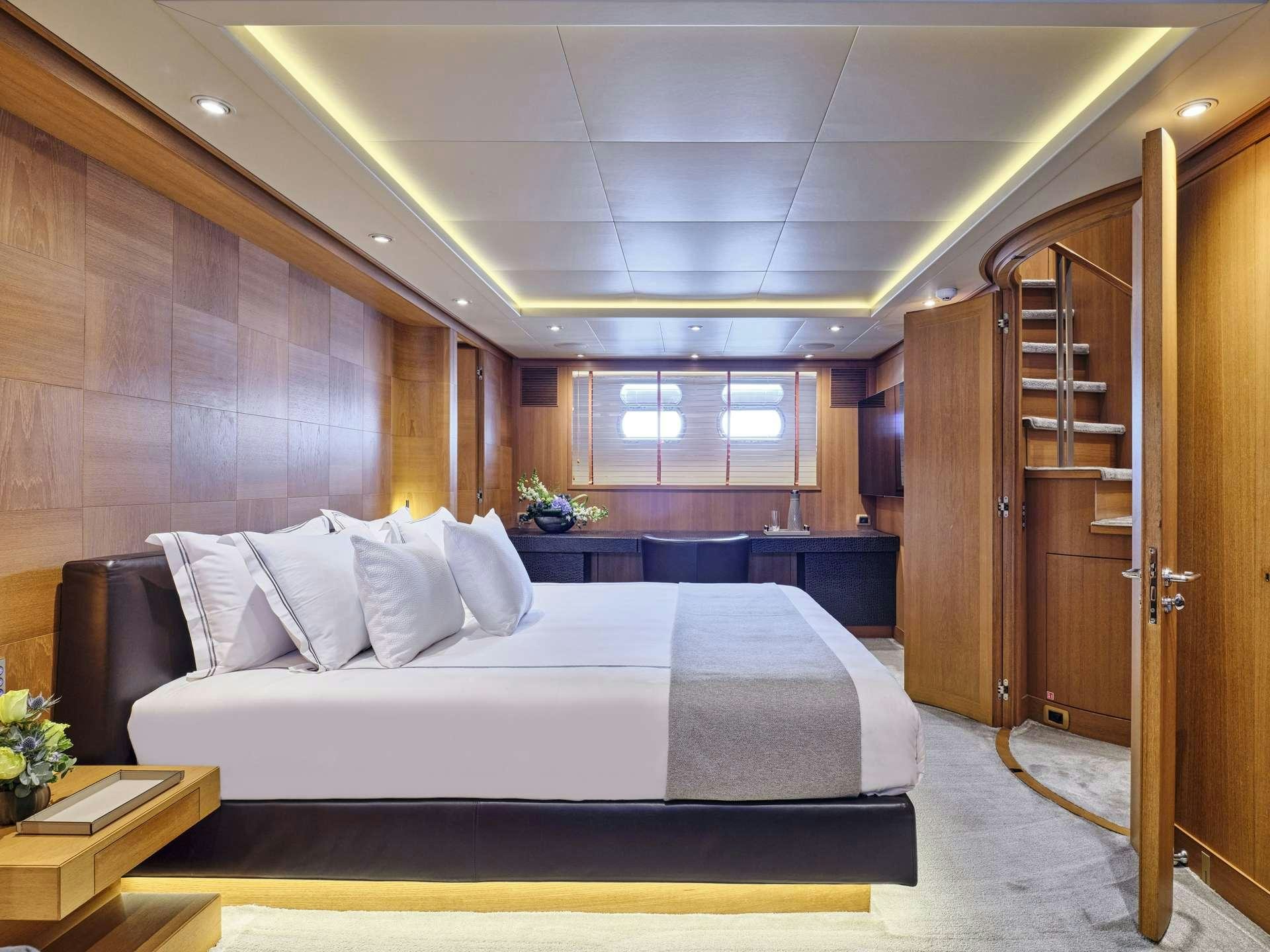 a bed in a room aboard TIGRA Yacht for Charter