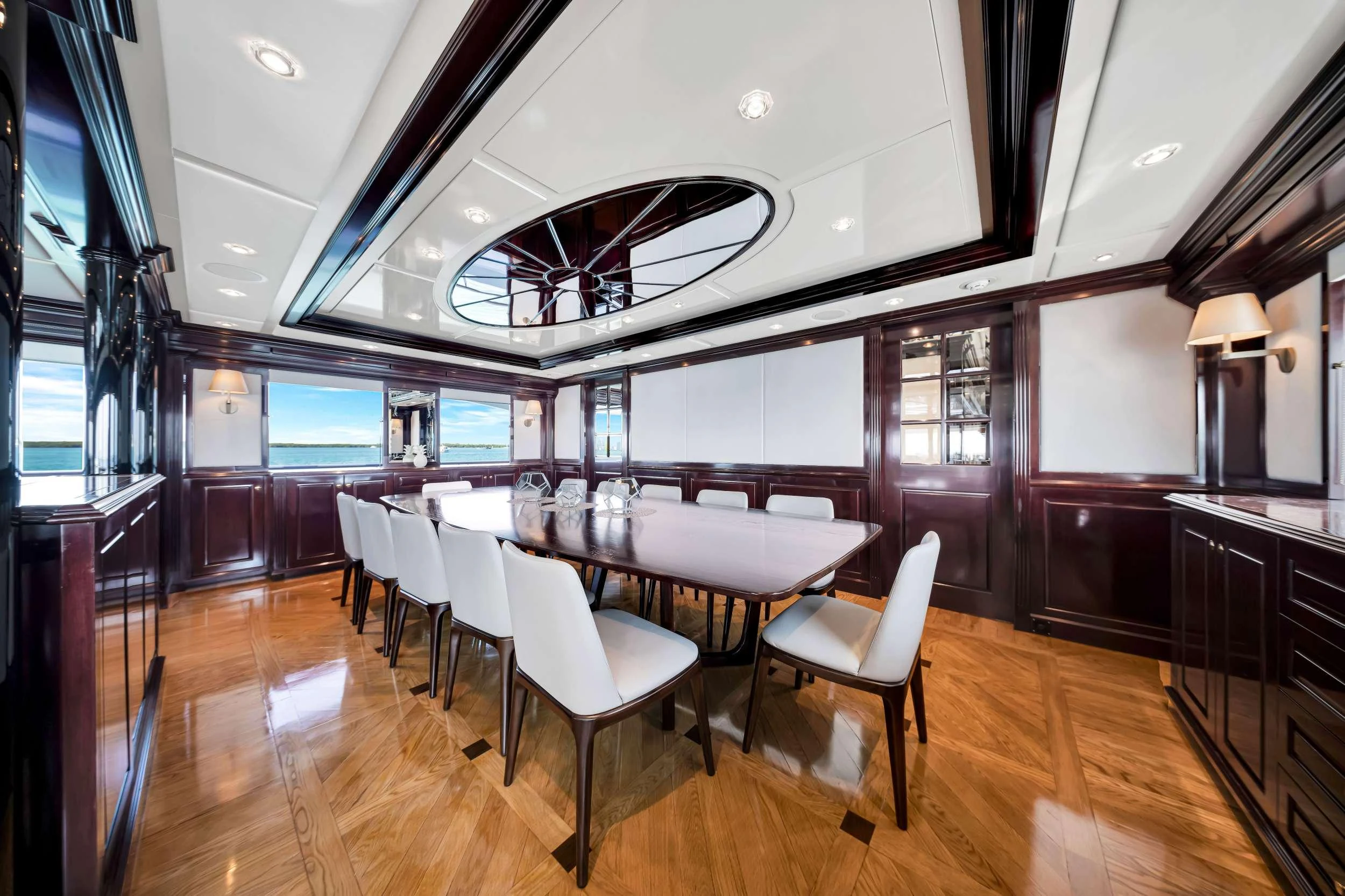 a large room with tables and chairs aboard SWEET CAROLINE II Yacht for Charter