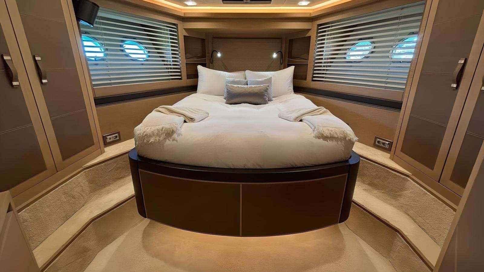 a bed in a room aboard NAYLA Yacht for Charter