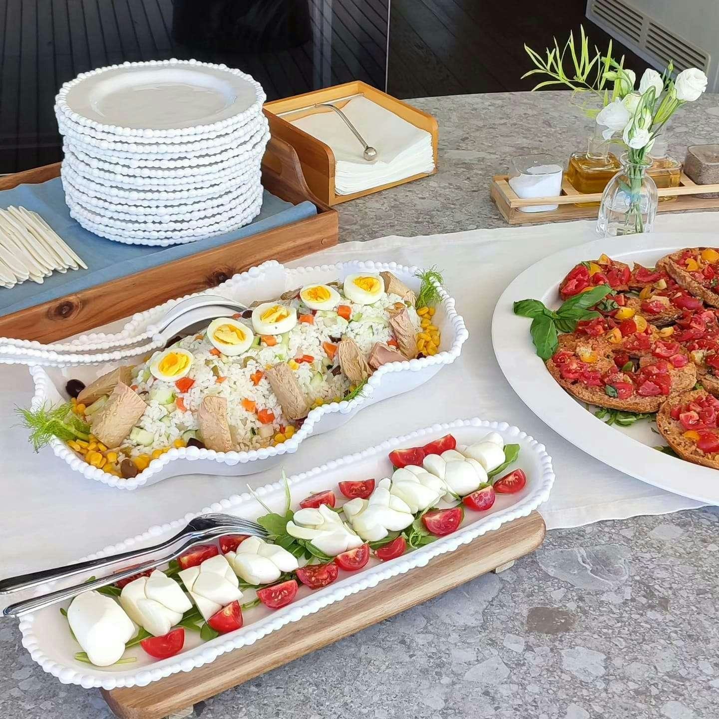 a table with food on it aboard DEAONE Yacht for Charter
