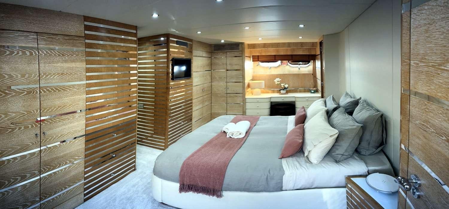 a bed in a room aboard DEAONE Yacht for Charter