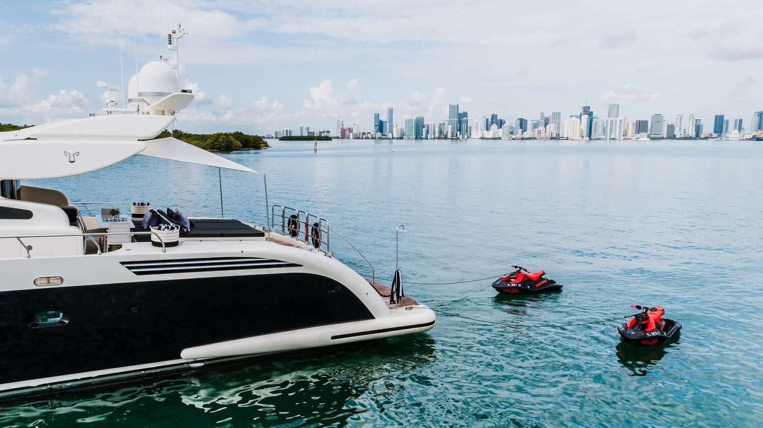 a couple of boats in the water aboard CASSINELLA Yacht for Charter