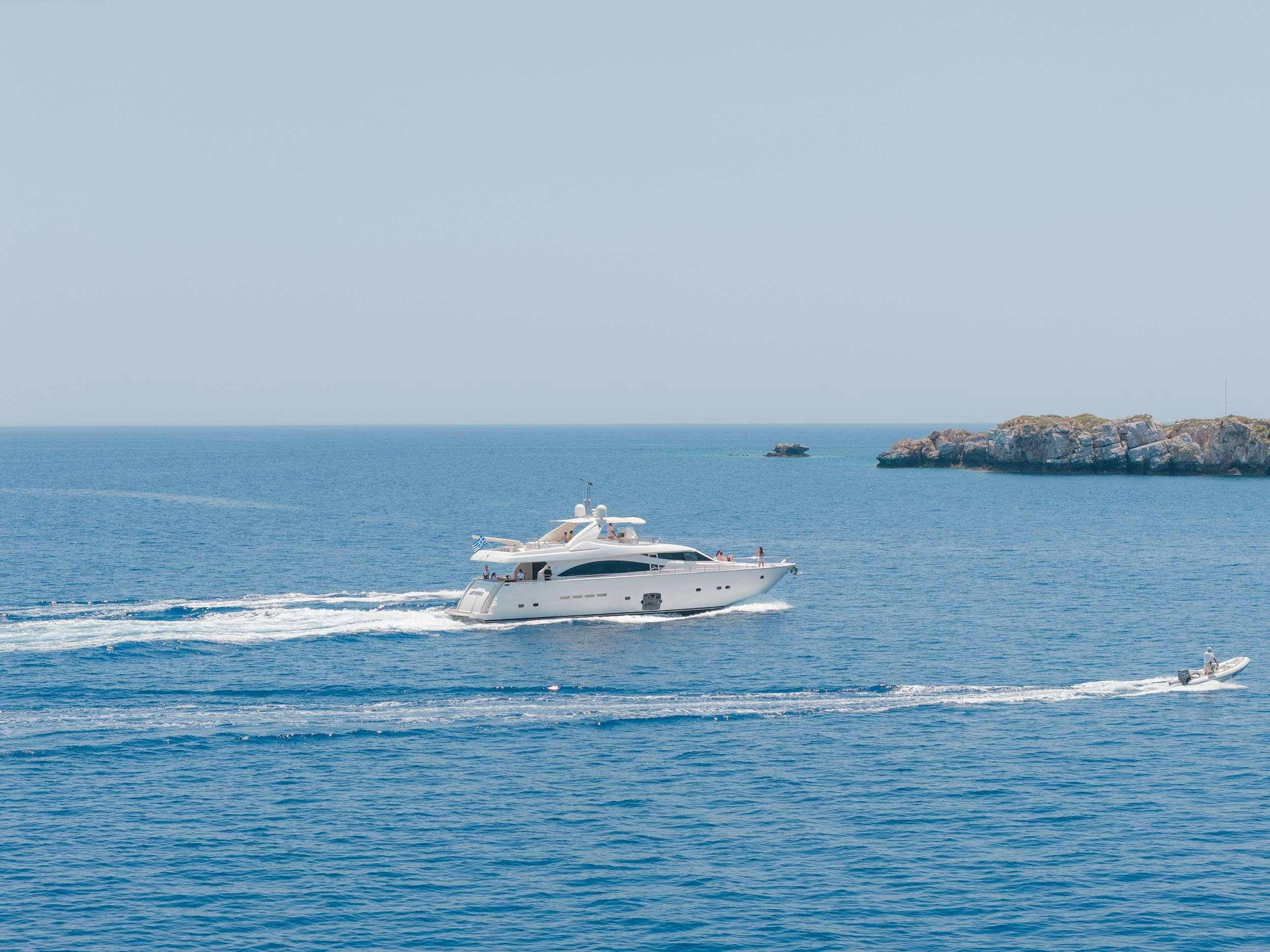 a boat on the water aboard NATASSA ( EX LADY NATASA) Yacht for Charter