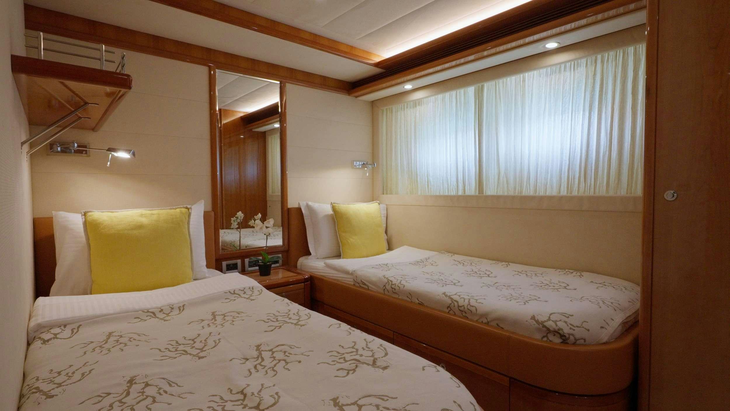 a room with two beds aboard NATASSA ( EX LADY NATASA) Yacht for Charter