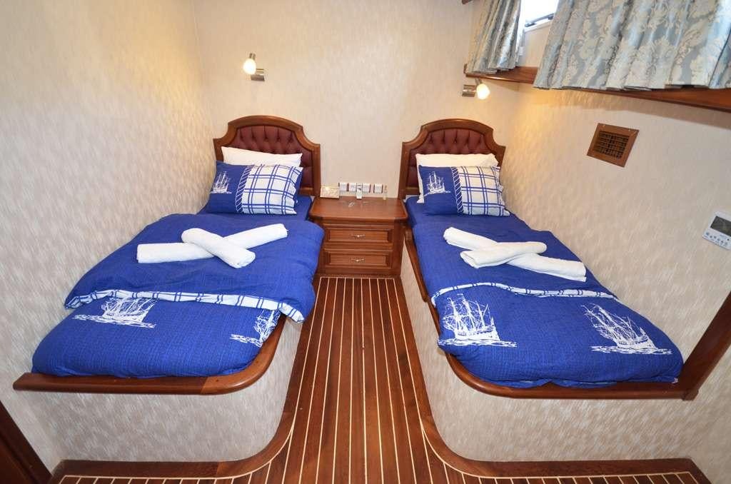 beds in a room aboard C. TANER 2 Yacht for Charter