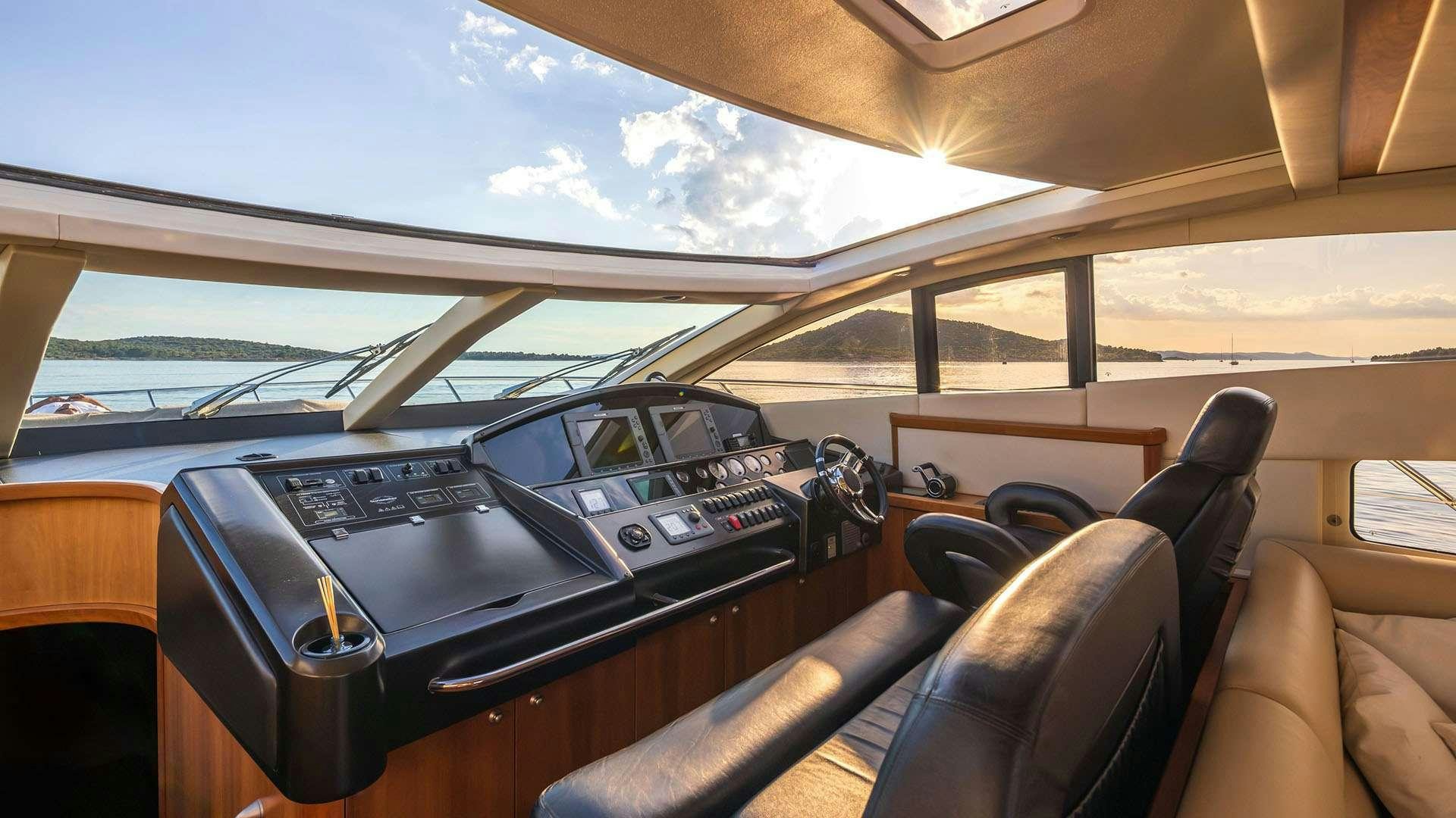 inside of a car aboard BOY TOY Yacht for Charter