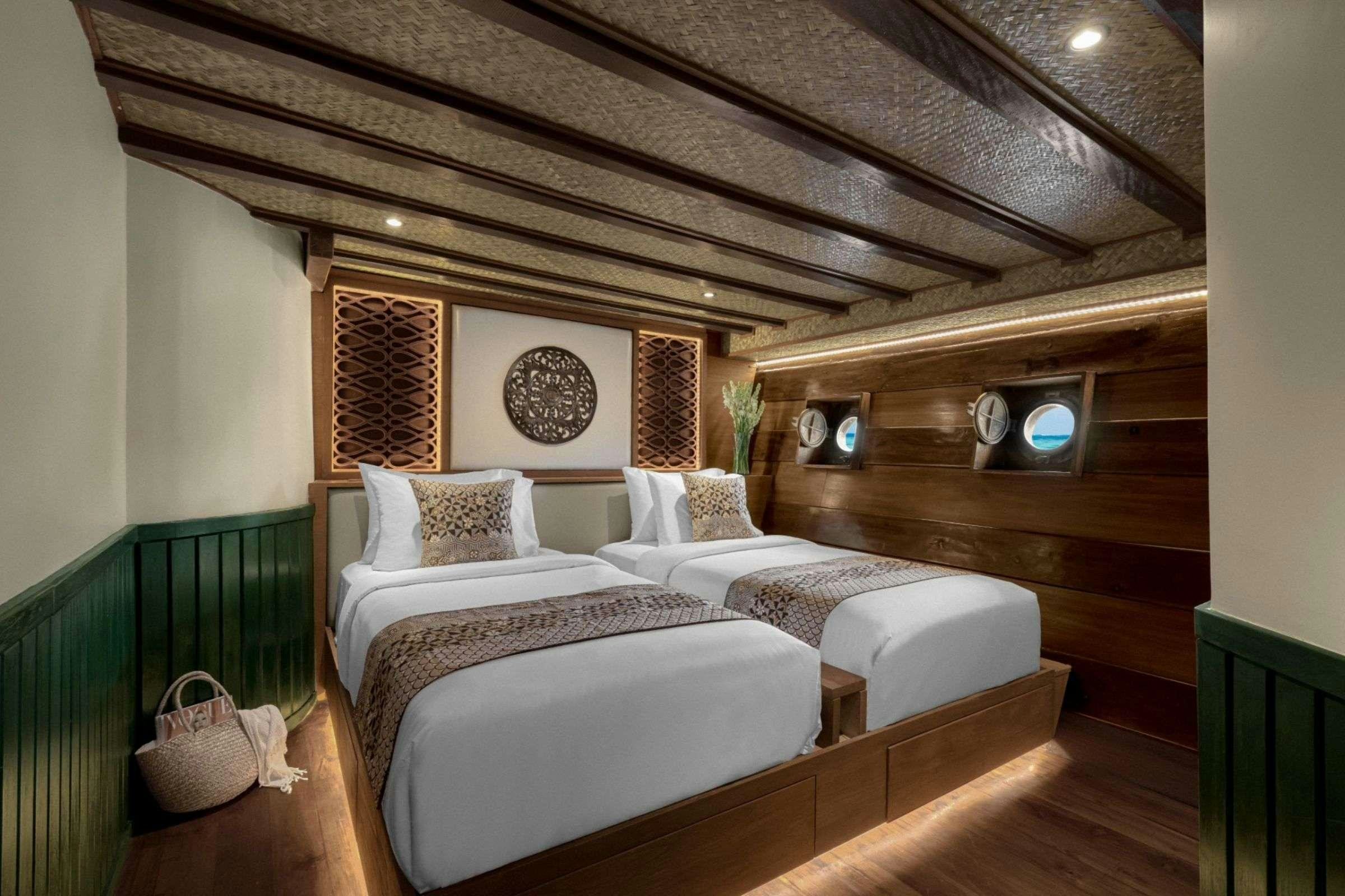 a room with two beds aboard SAMSARA SAMUDRA Yacht for Charter