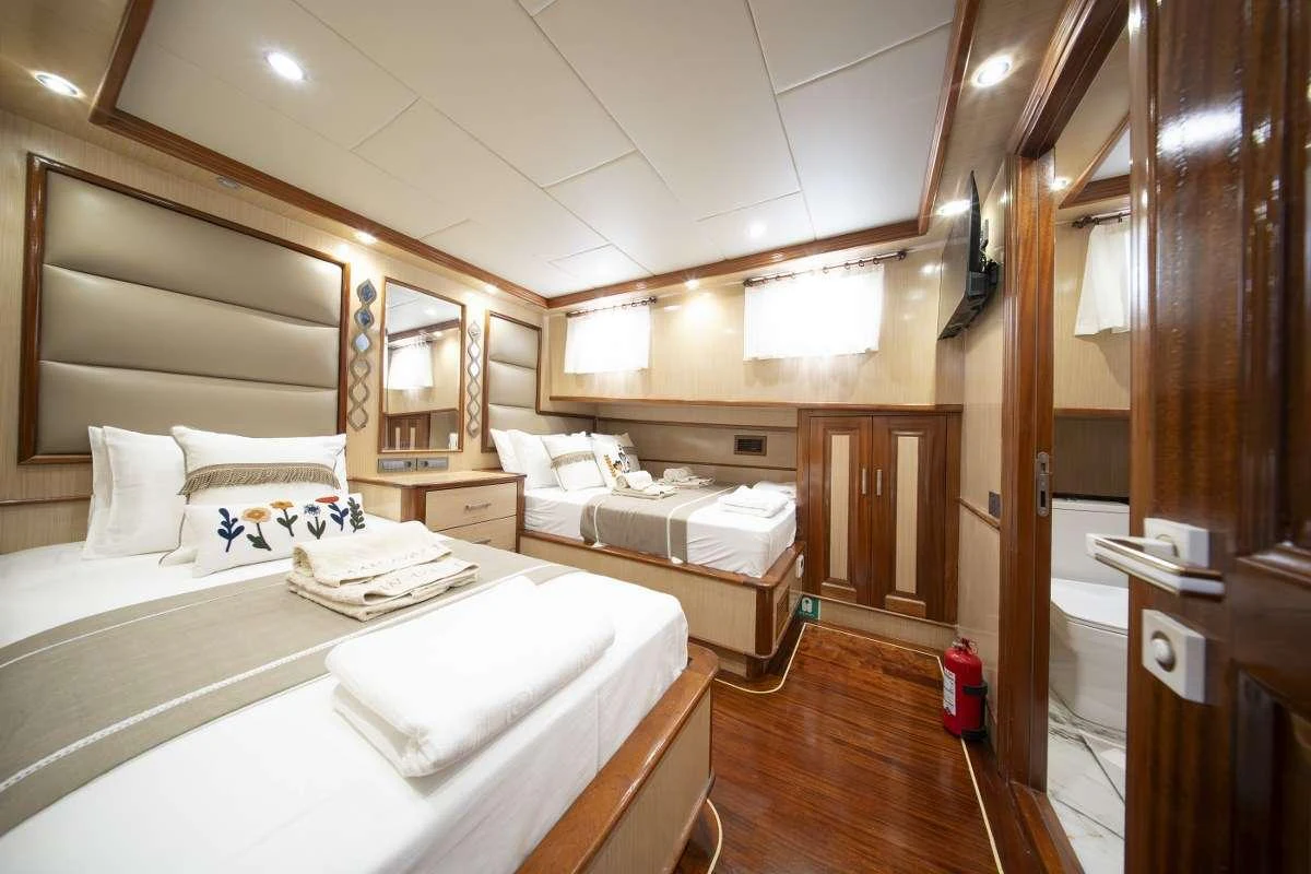 a room with two beds aboard KAAN AYAZ Yacht for Charter