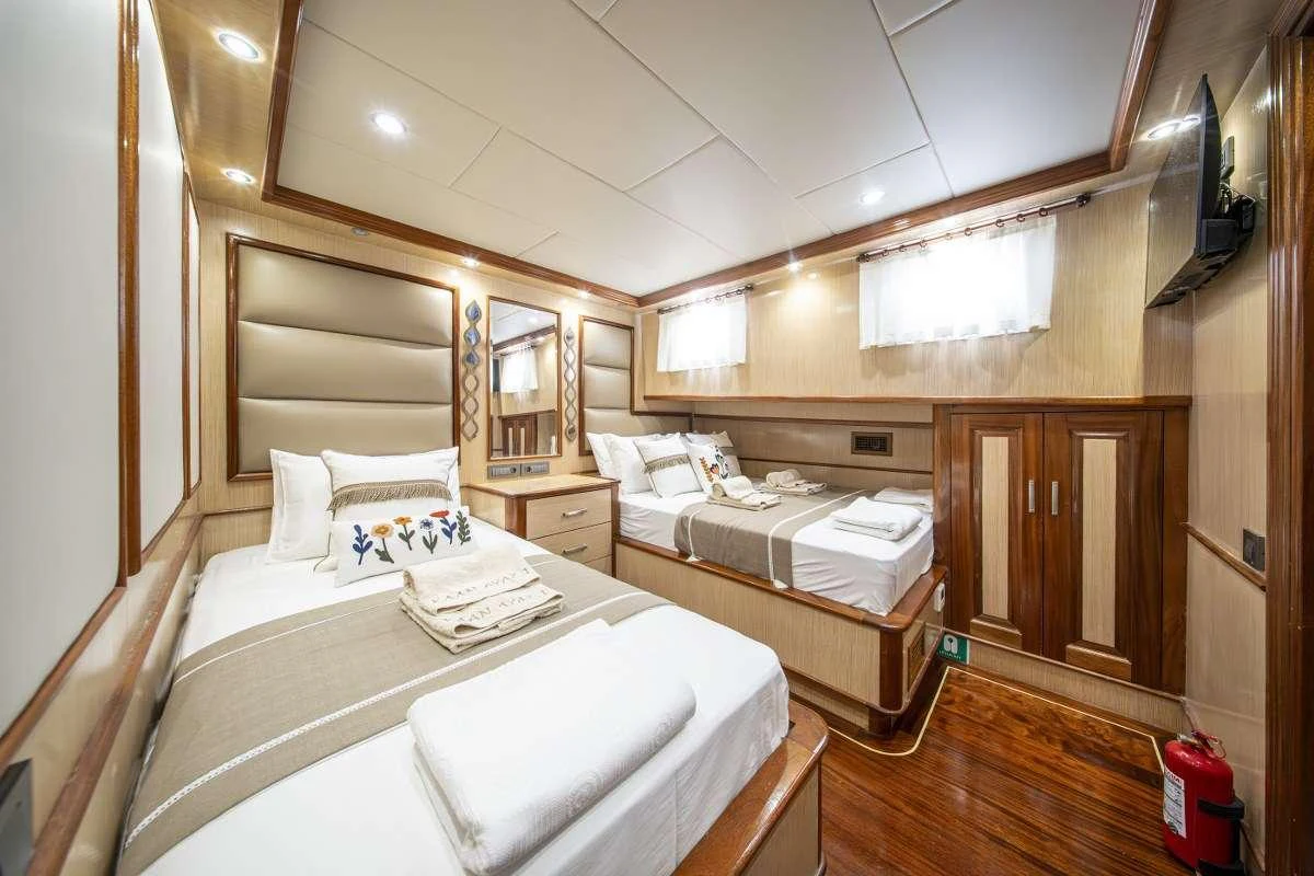 a room with two beds aboard KAAN AYAZ Yacht for Charter