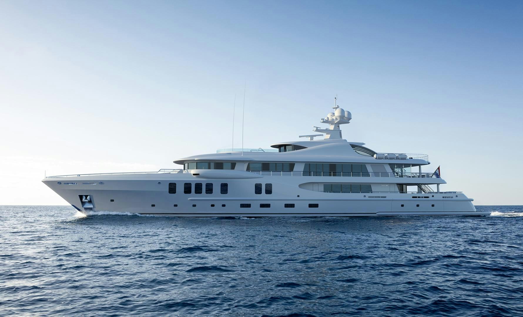 a white boat in the water aboard AMELS 220 Yacht for Sale