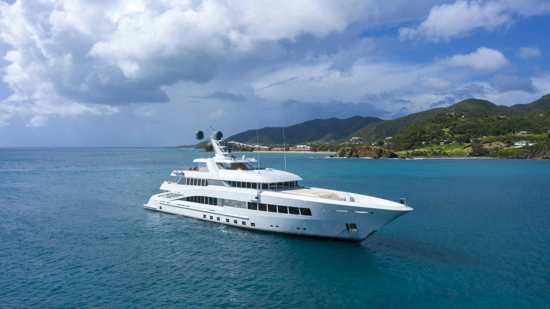 a white yacht in the water aboard ROCK.IT Yacht for Sale