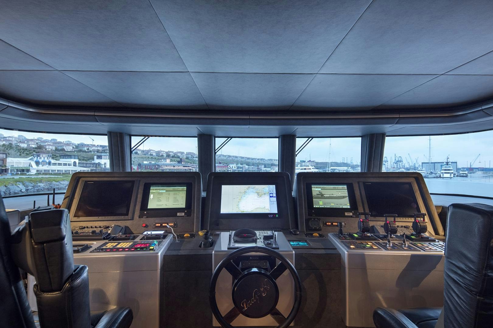 a room with computers and monitors aboard THUNDER Yacht for Sale