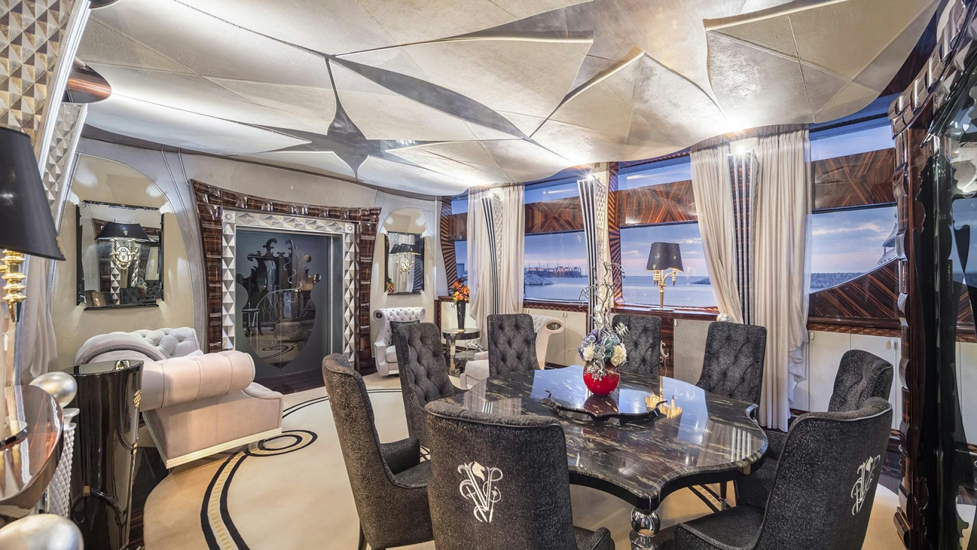 a living room with a large window aboard THUNDER Yacht for Sale