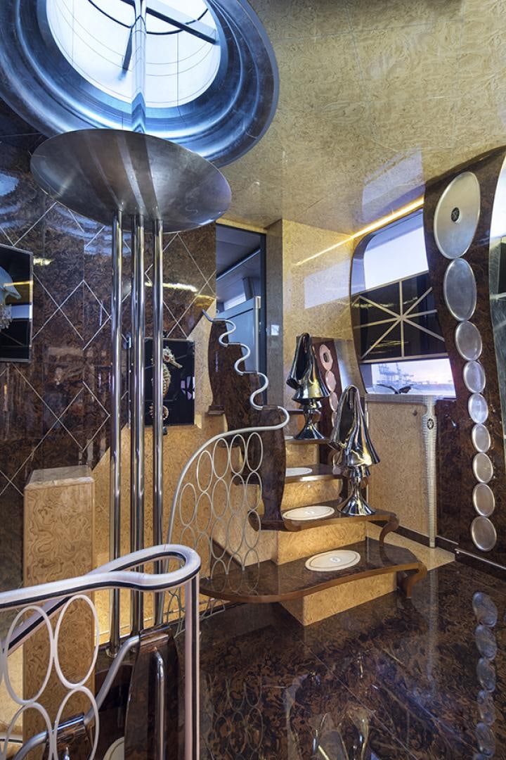 a room with a table and chairs aboard THUNDER Yacht for Sale