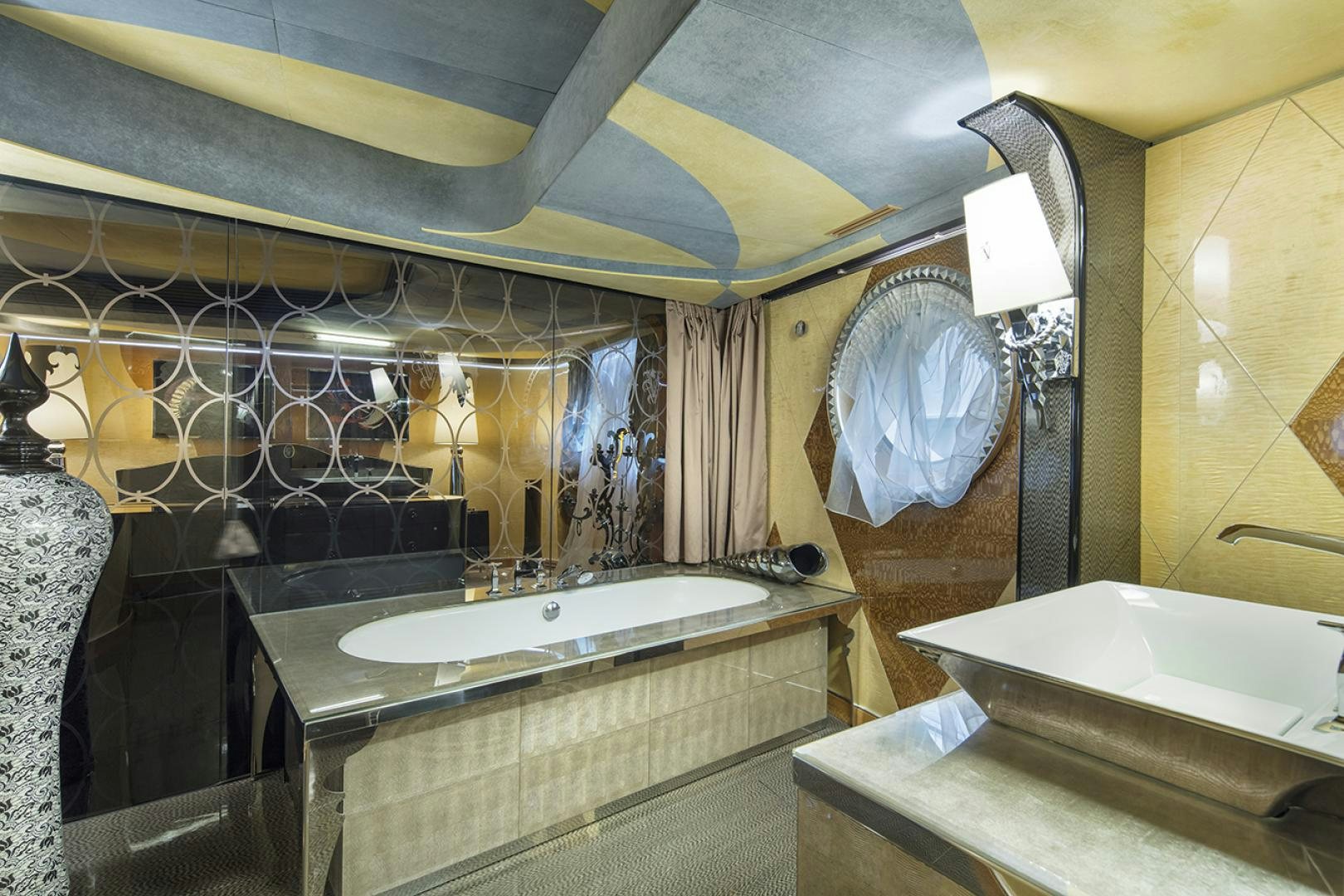 a bathroom with a large bathtub aboard THUNDER Yacht for Sale