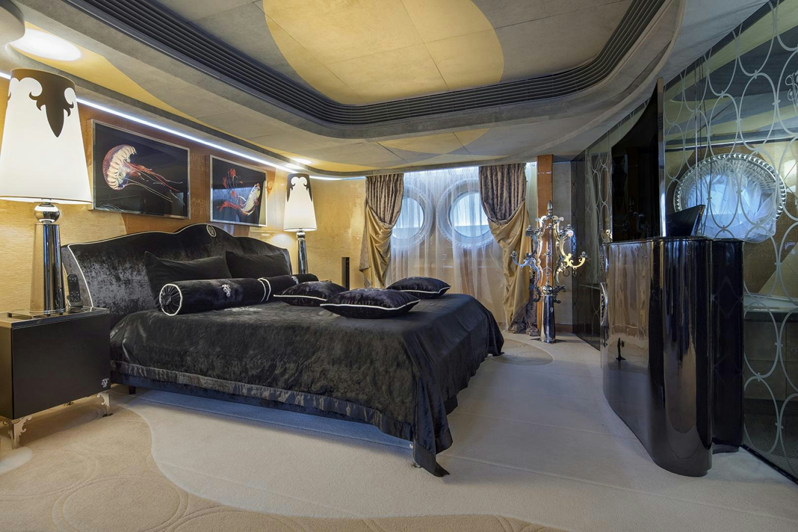 a large bedroom with a large bed aboard THUNDER Yacht for Sale