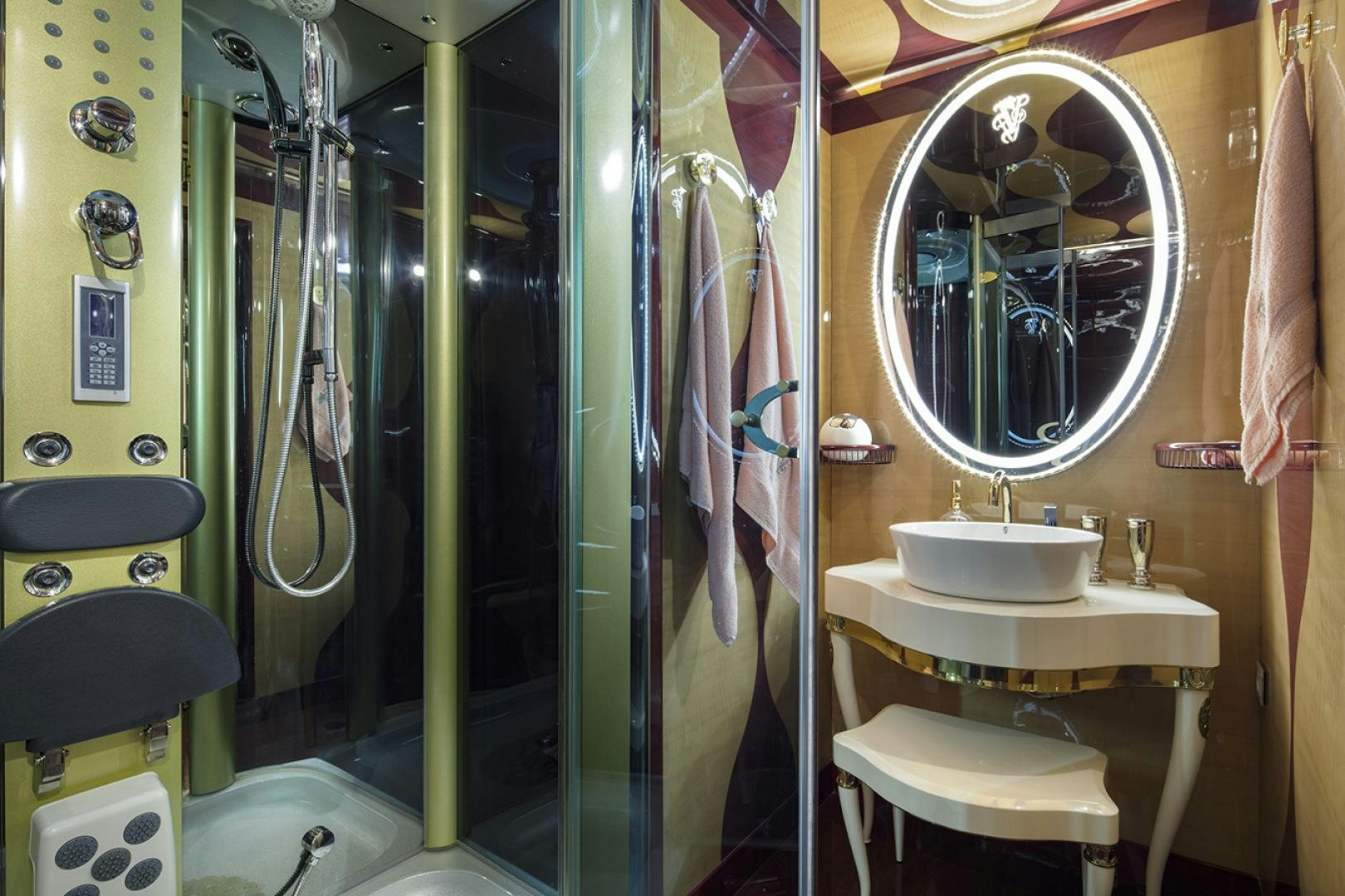 a bathroom with a glass shower aboard THUNDER Yacht for Sale