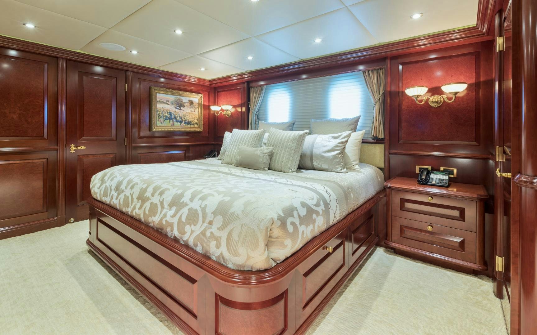 a bed in a room aboard AMARULA SUN Yacht for Sale