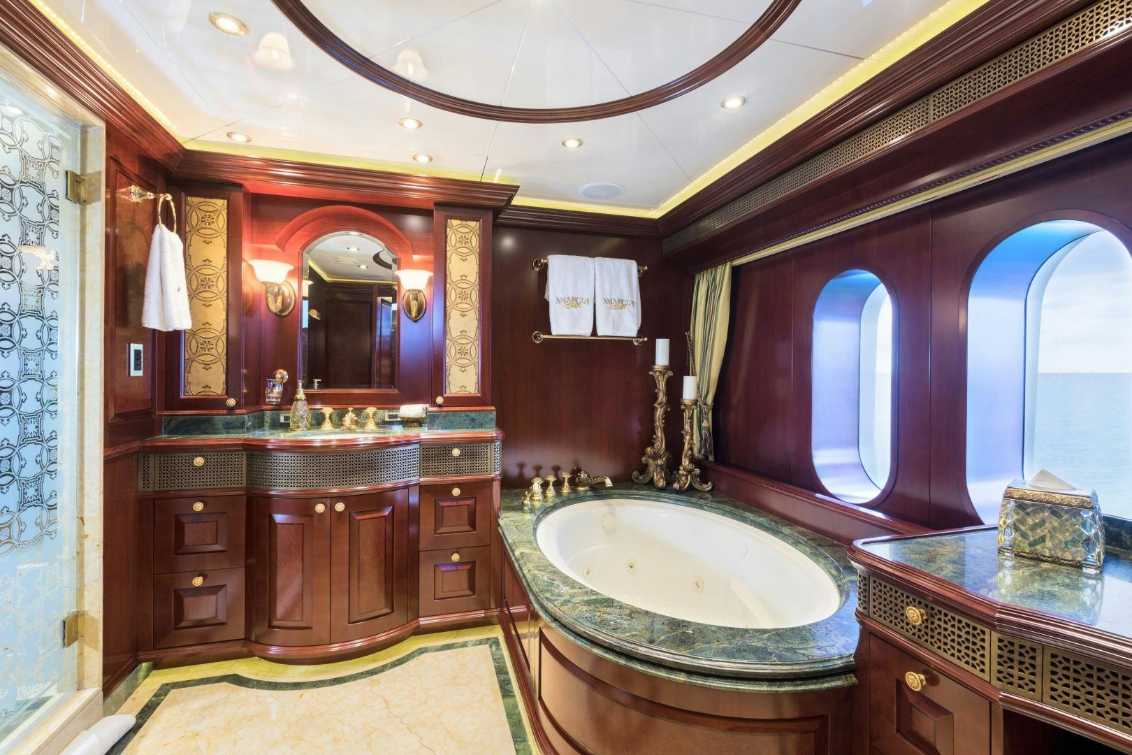a bathroom with a large round sink aboard AMARULA SUN Yacht for Sale