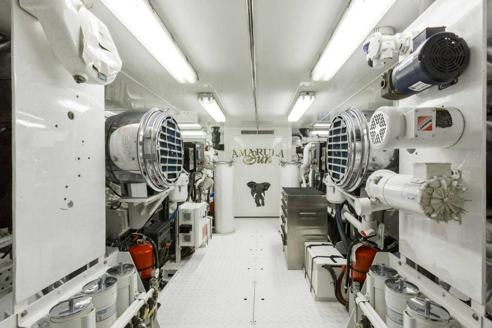 a room with white machines aboard AMARULA SUN Yacht for Sale
