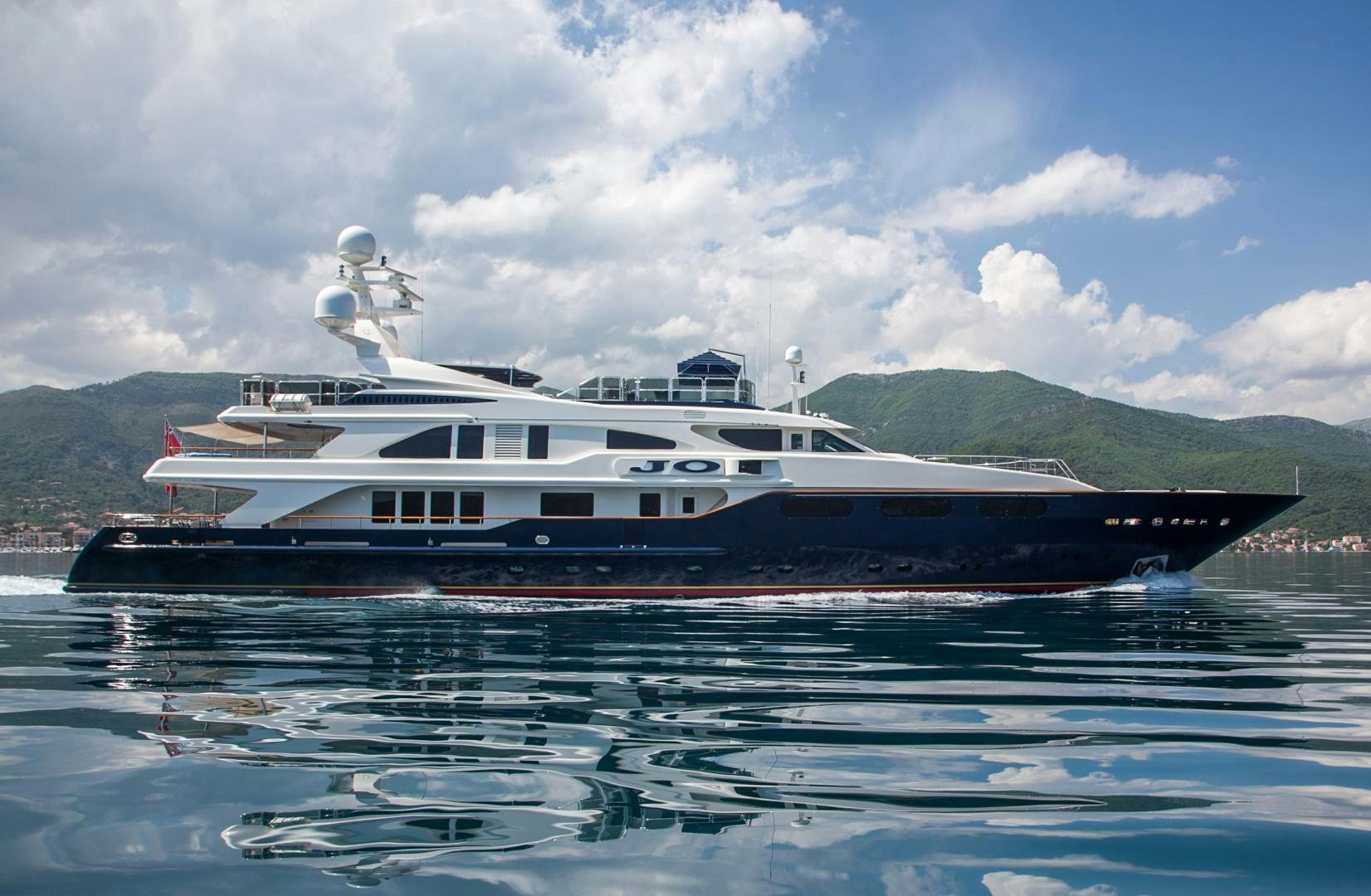 a large boat in the water aboard JO I Yacht for Sale