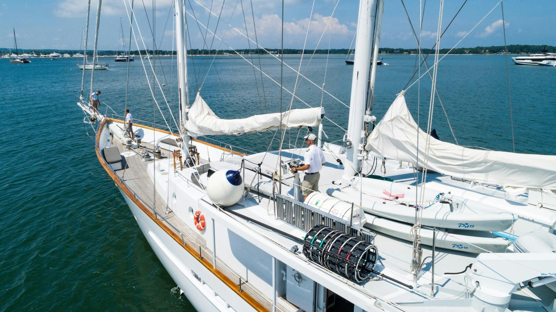 a boat with a white sail aboard ARABELLA II Yacht for Sale