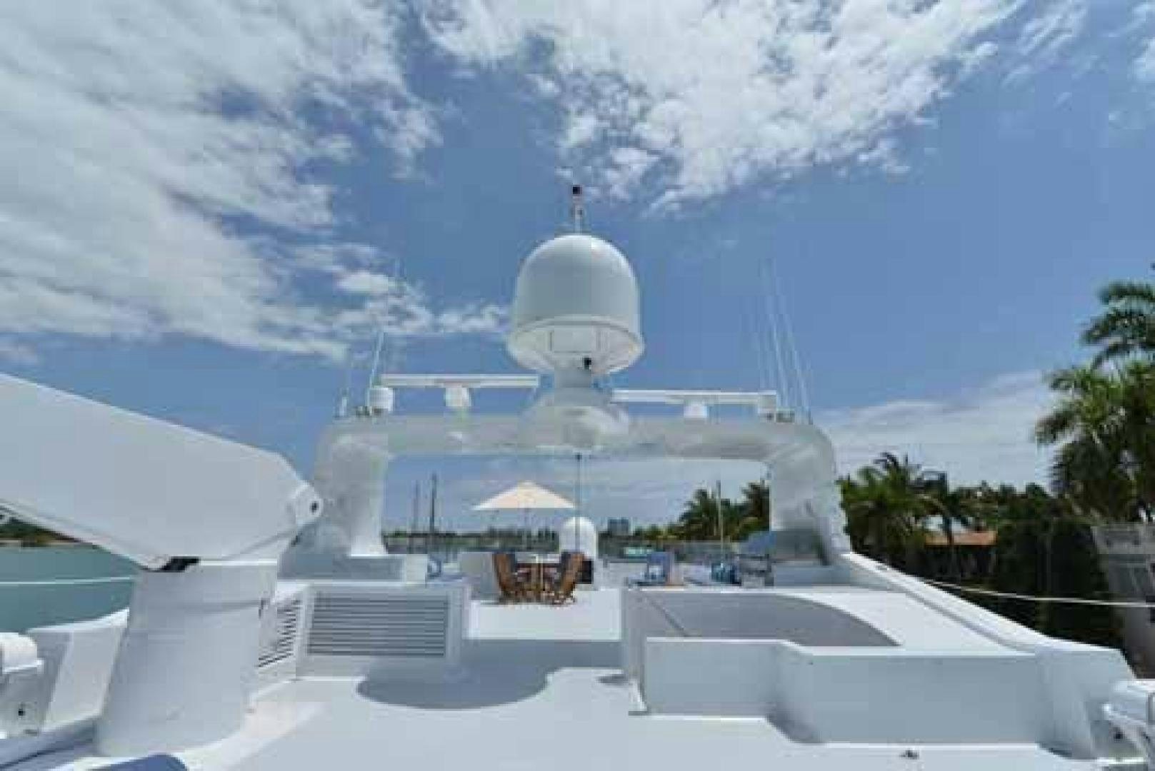 a large white ship aboard UTOPIA III Yacht for Sale