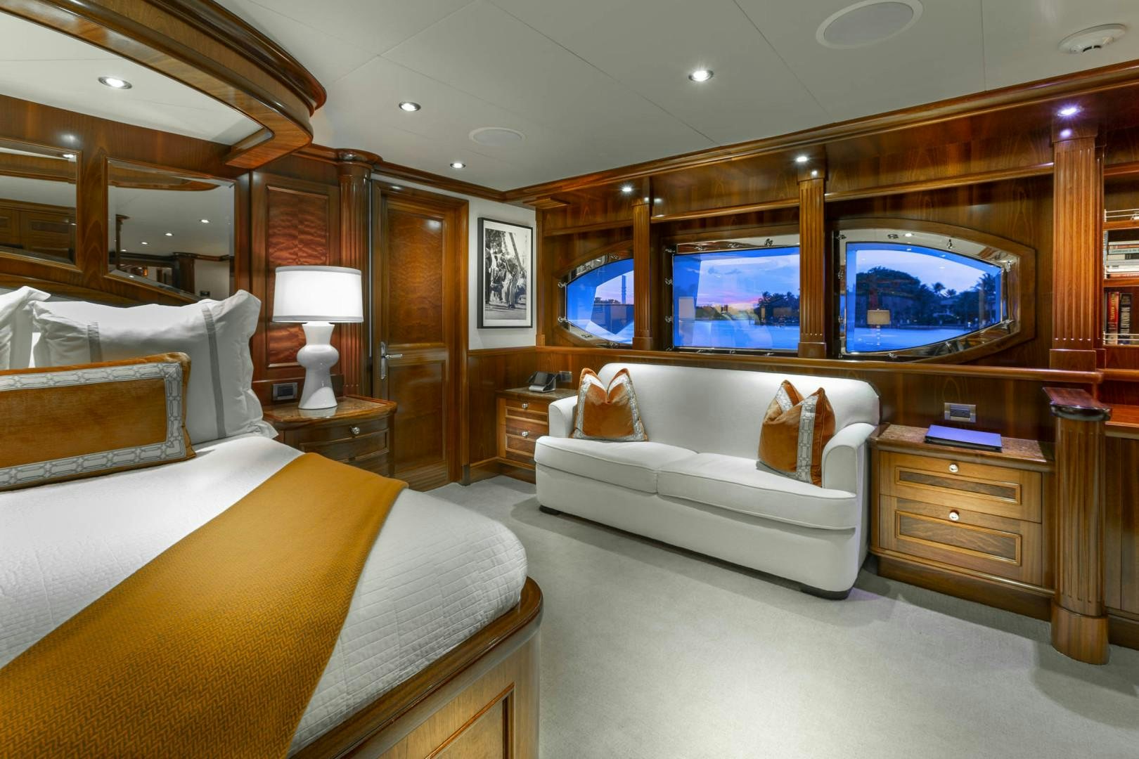 a room with a bed and a tv aboard FAR FROM IT Yacht for Sale