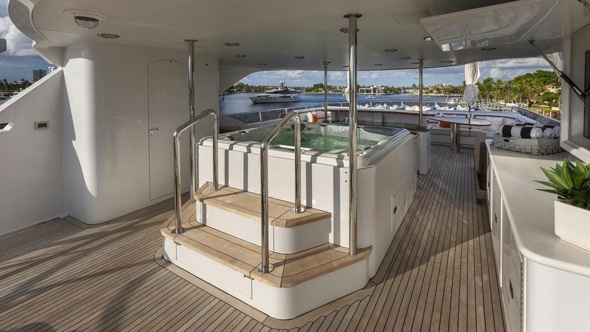 a room with a large pool aboard FAR FROM IT Yacht for Sale