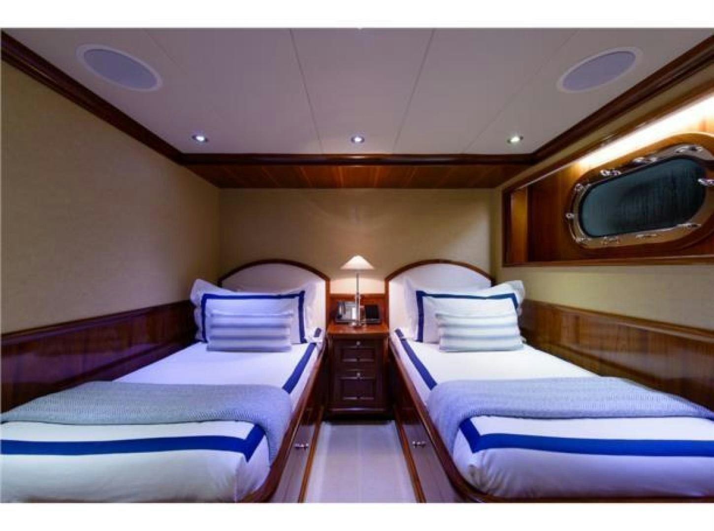 a room with two beds aboard FAR FROM IT Yacht for Sale