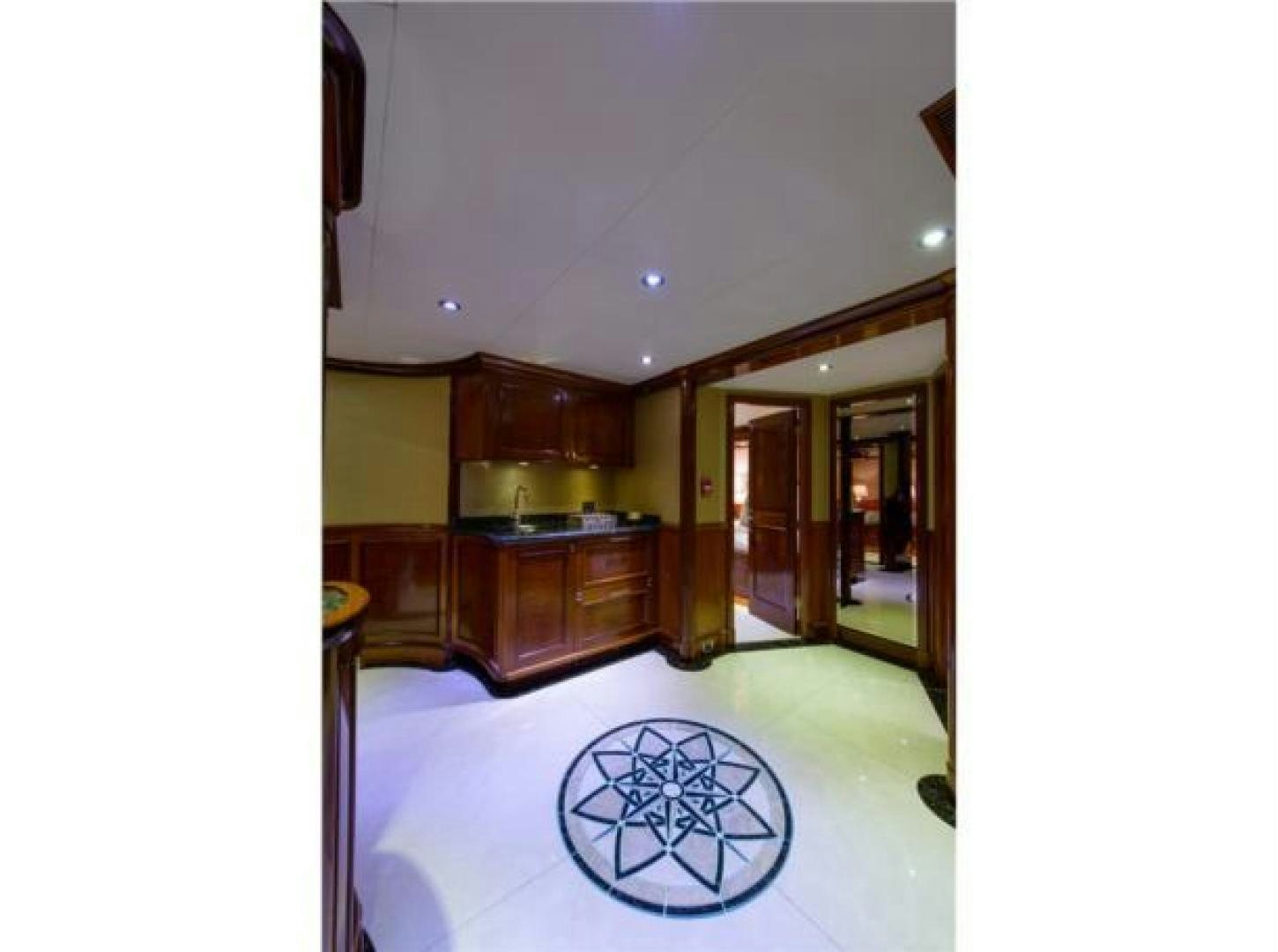 a room with a rug aboard FAR FROM IT Yacht for Sale